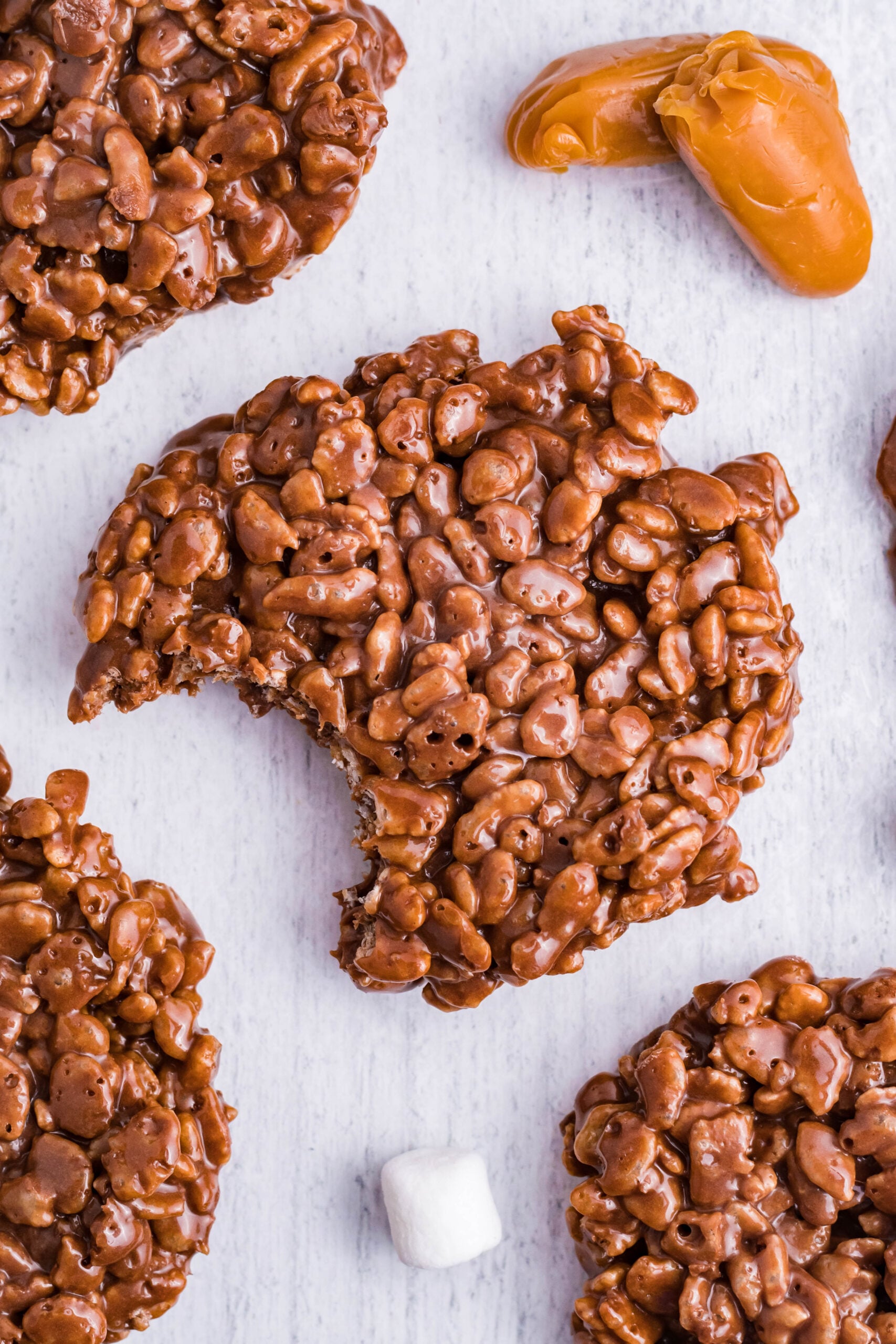 Overhead view of a cookie with a bite removed.
