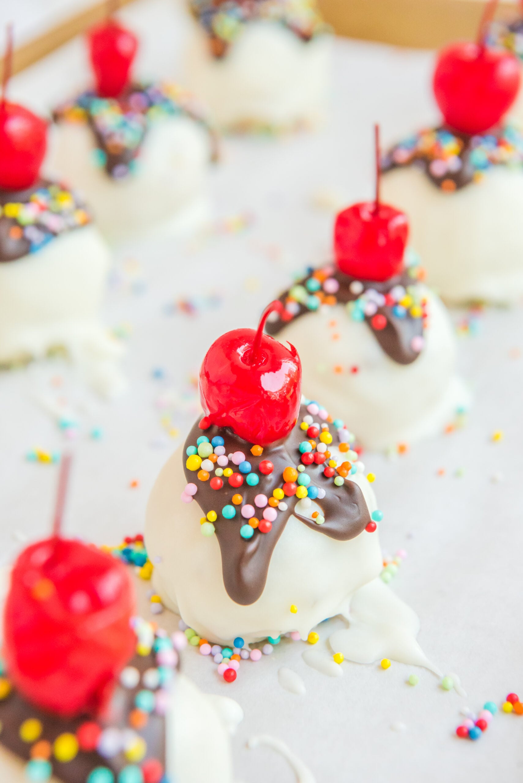 Close up view of Banana Truffles on a piece of parchment paper.