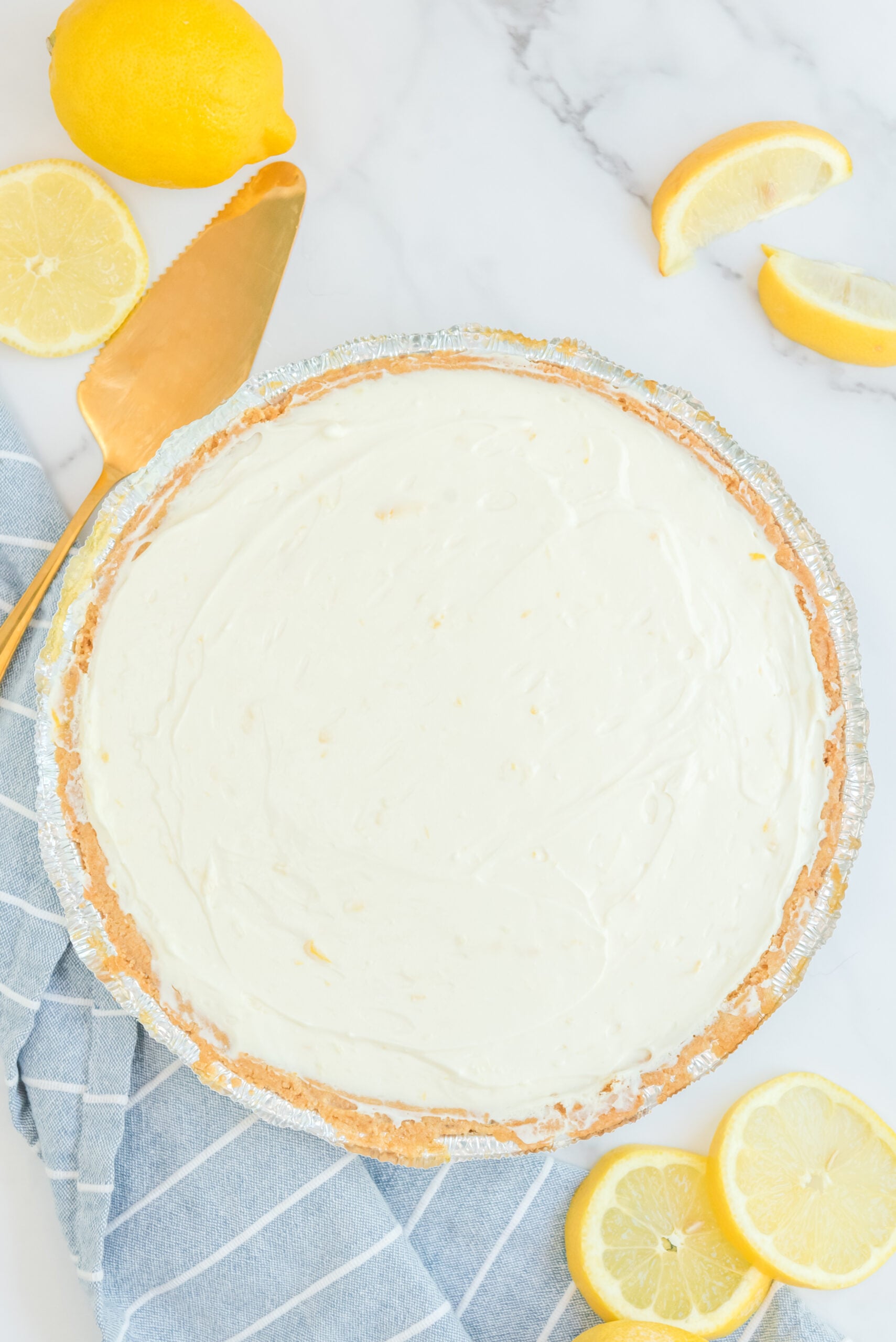Overhead view No Bake Lemon Cheesecake uncut.
