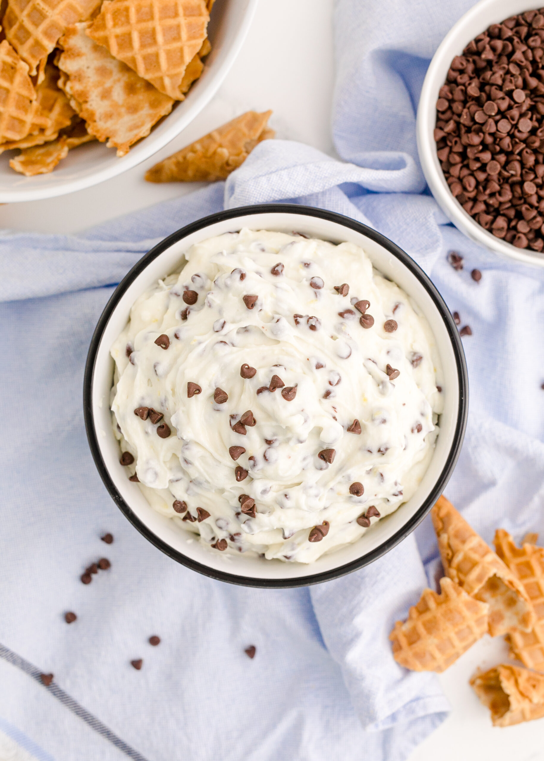 Overhead view of Cannoli Dip in a black and white dish.