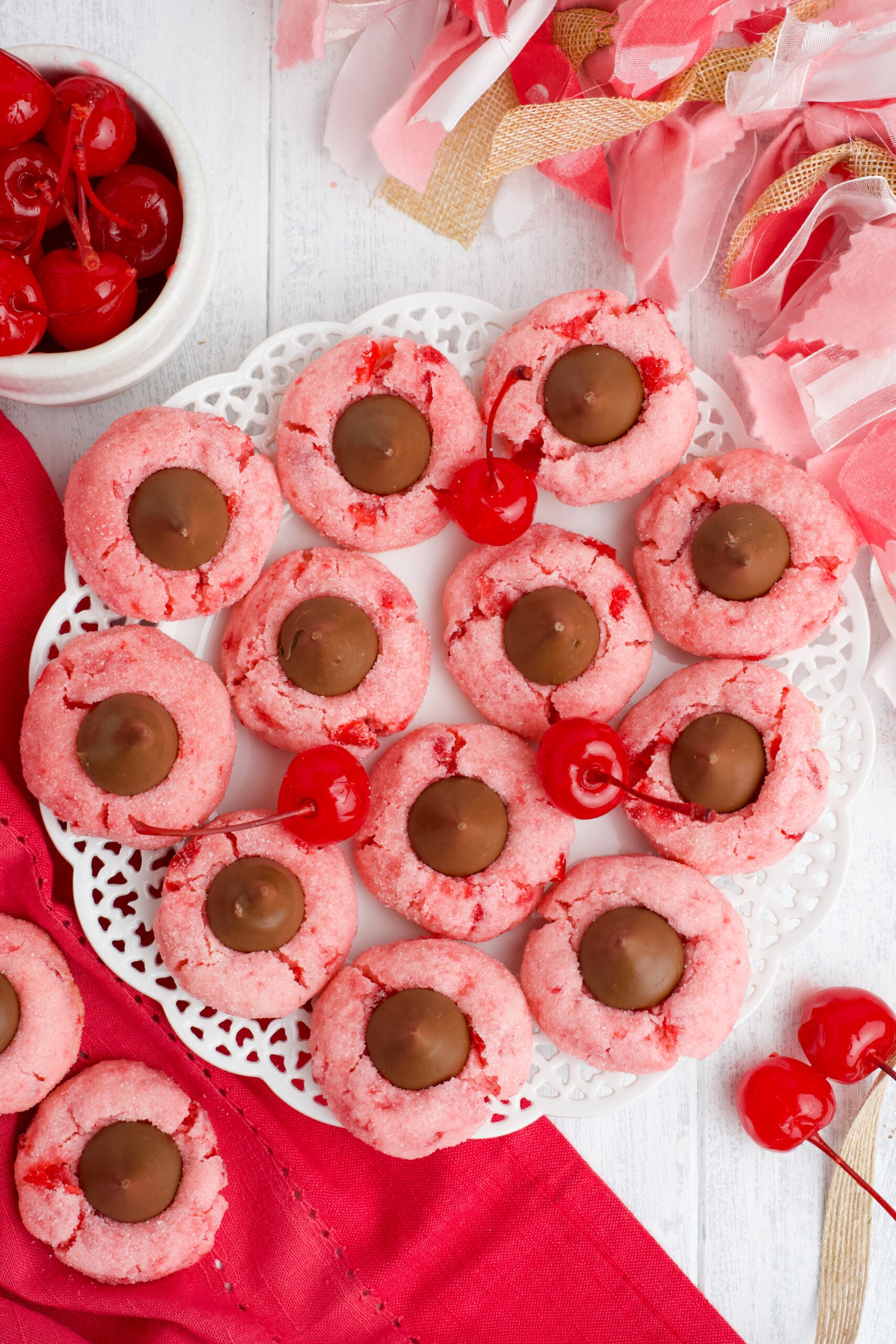 Overhead view of Cherry Blossom Cookies on a white dish.