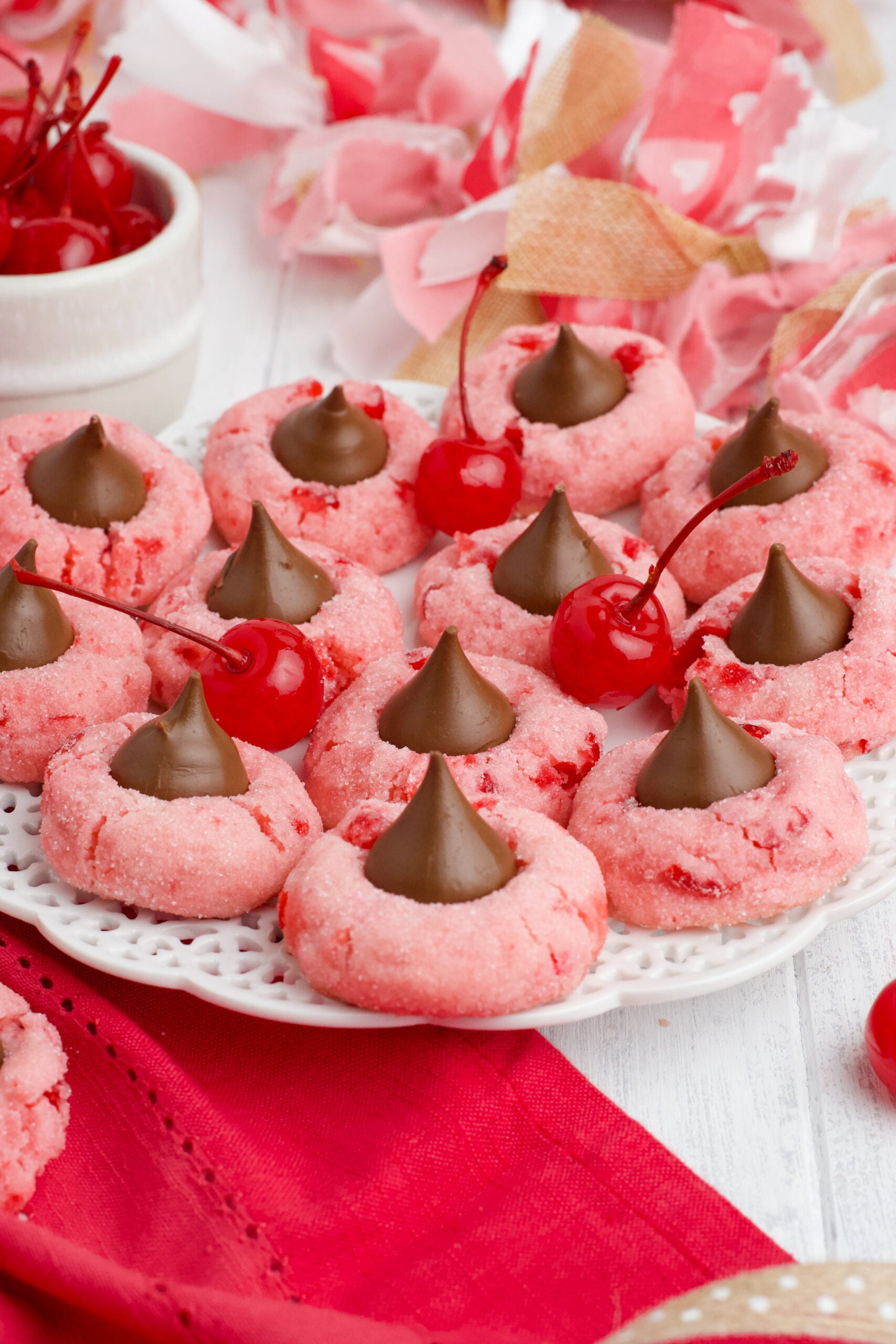 Front view of Cherry Blossom Cookies on a white dish.