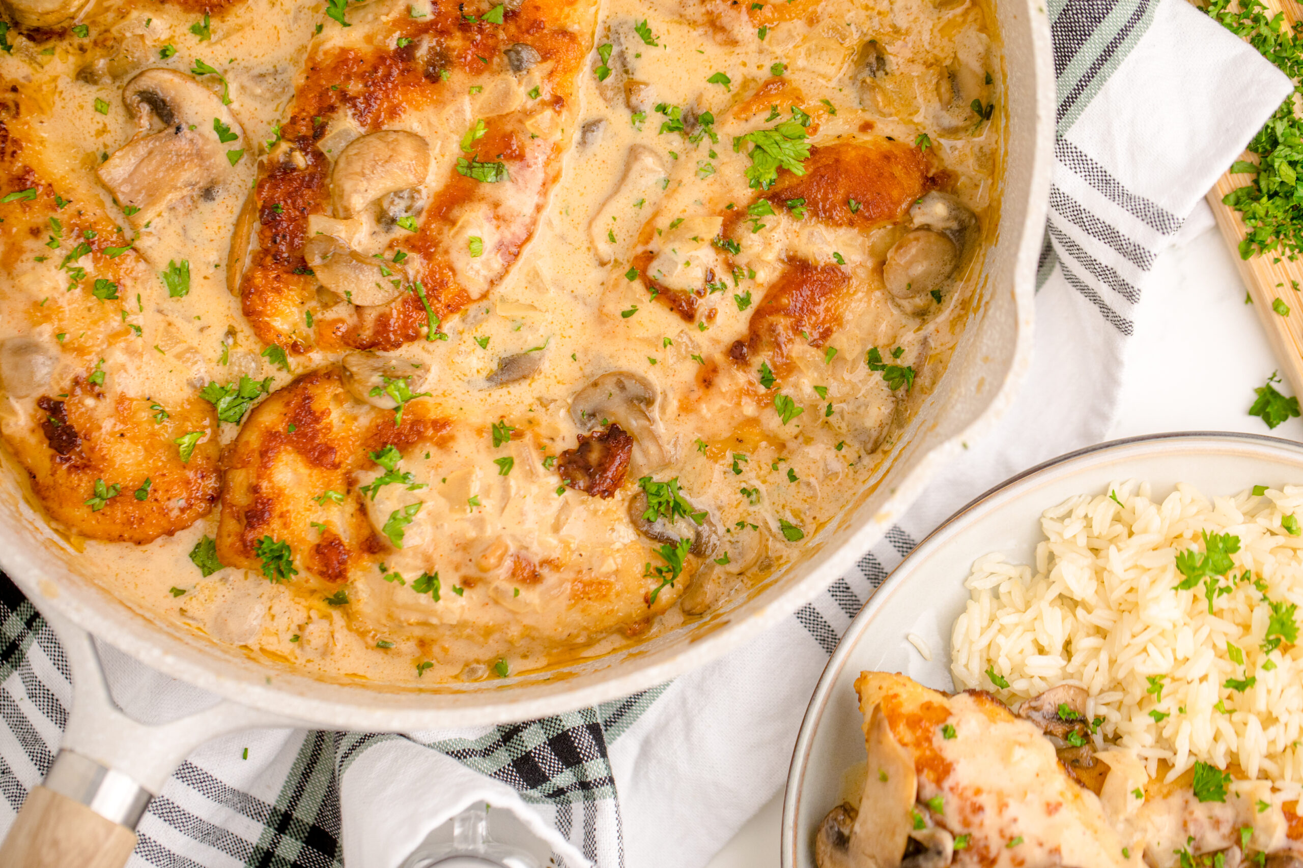 Overhead view of Chicken Marsala in a skillet.