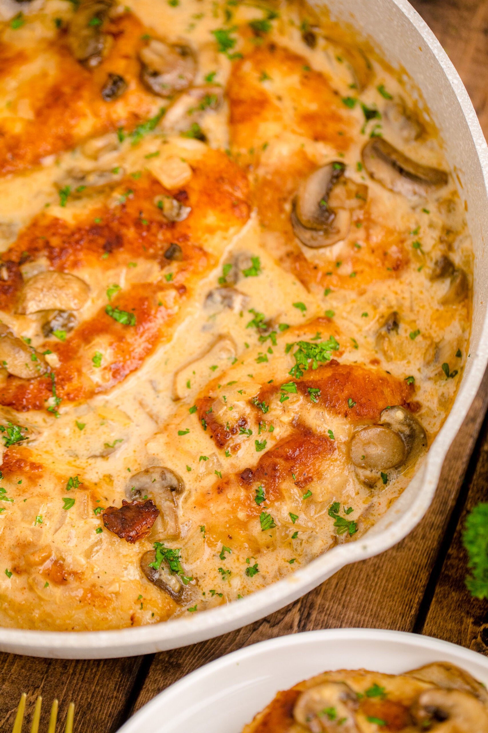 Up close view of Chicken Marsala in a skillet.