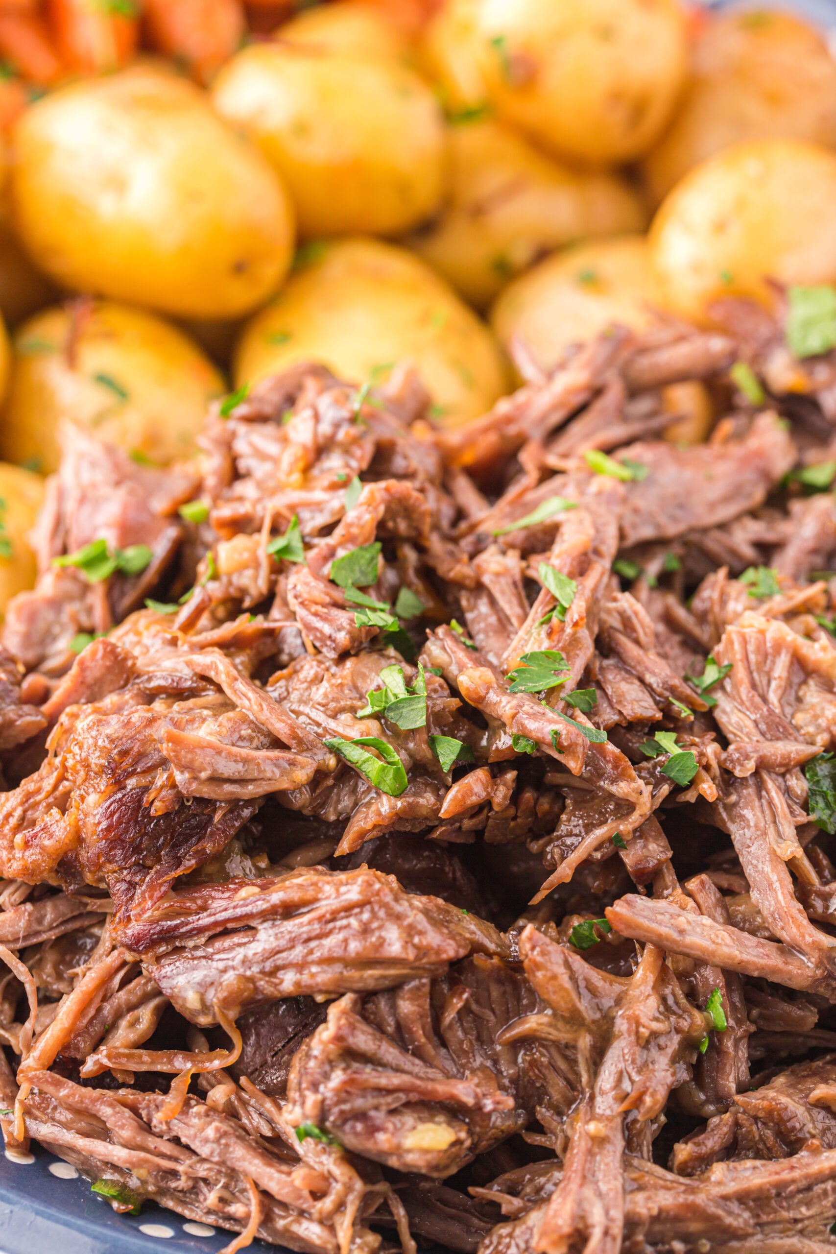 Close up of the Roast topped with fresh parsley.