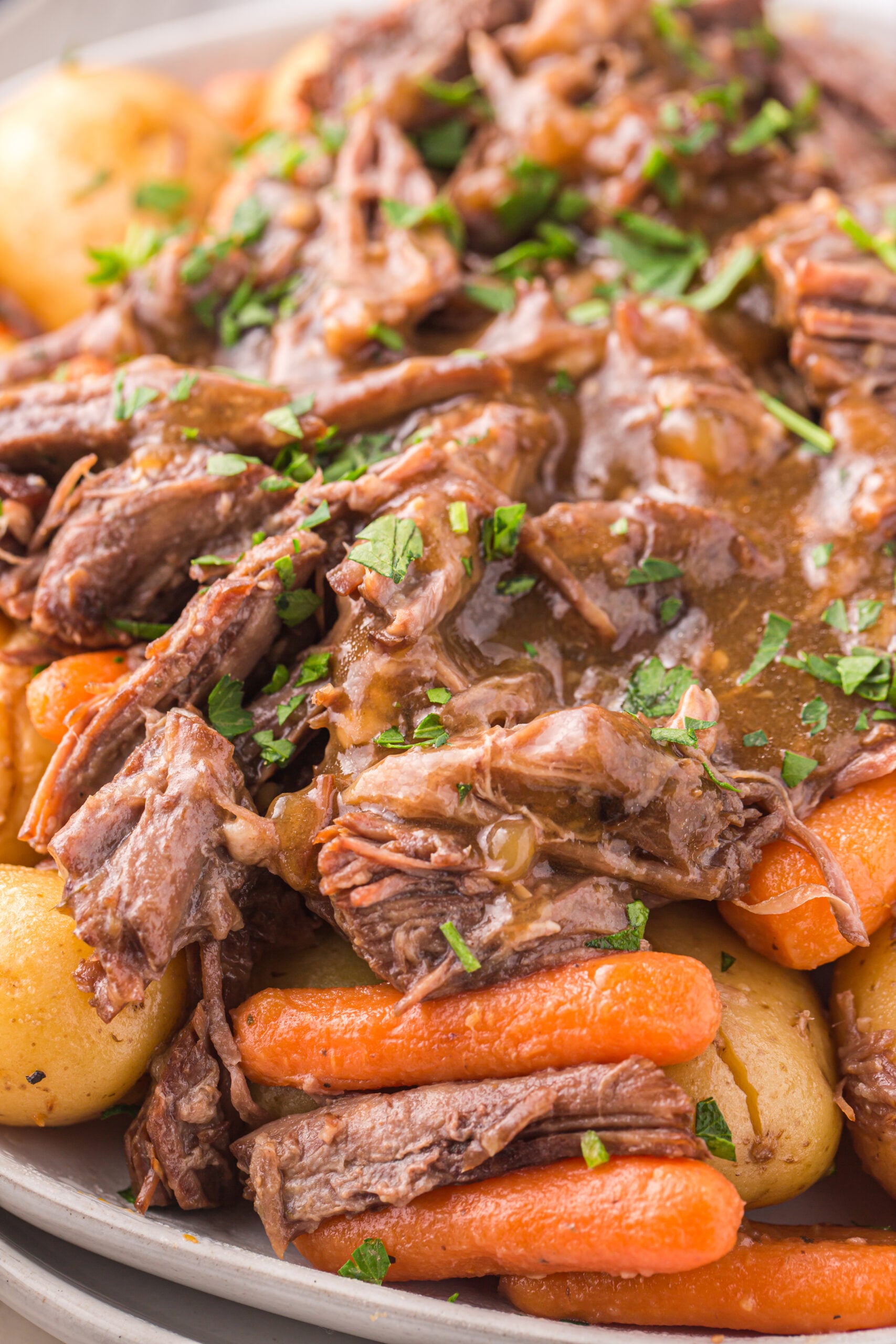 Close up of the Instant Pot Pot Roast topped with fresh parsley.