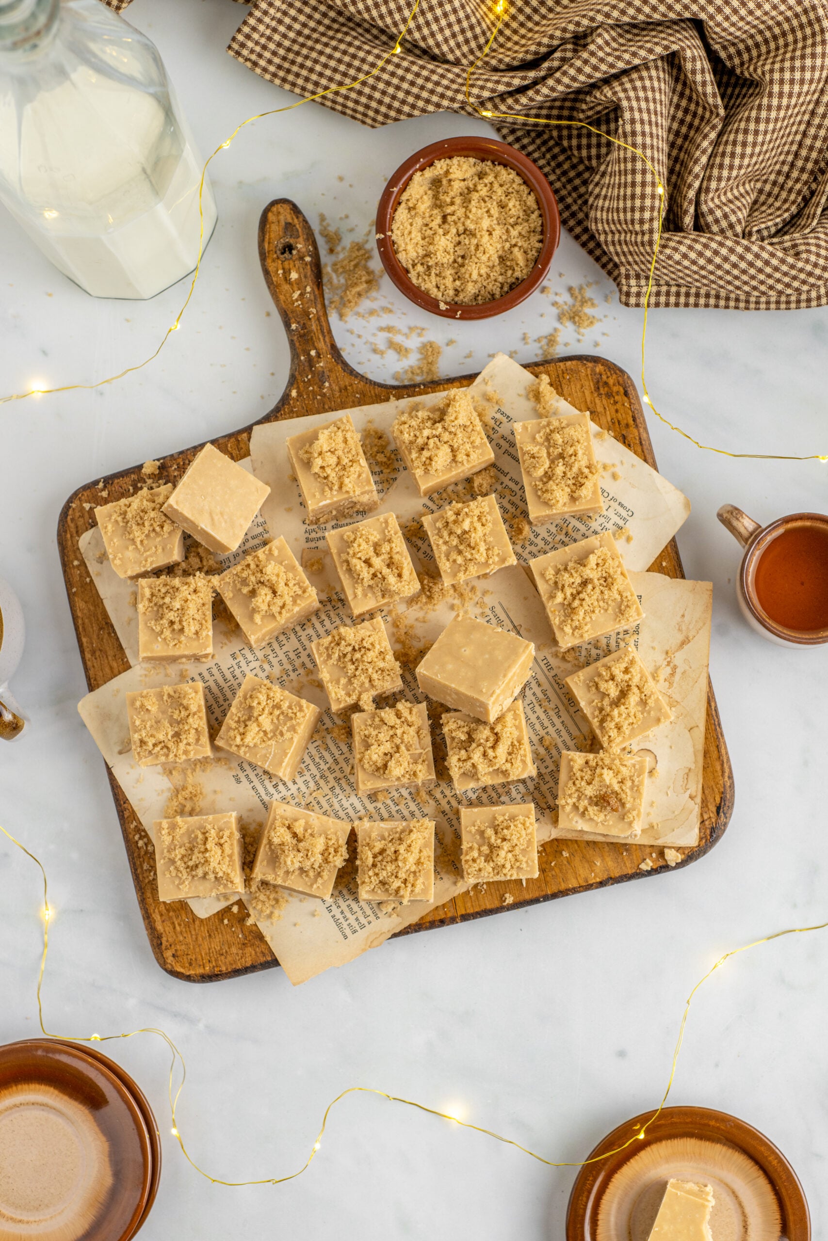 Overhead view of Penuche Fudge on a wooden board.