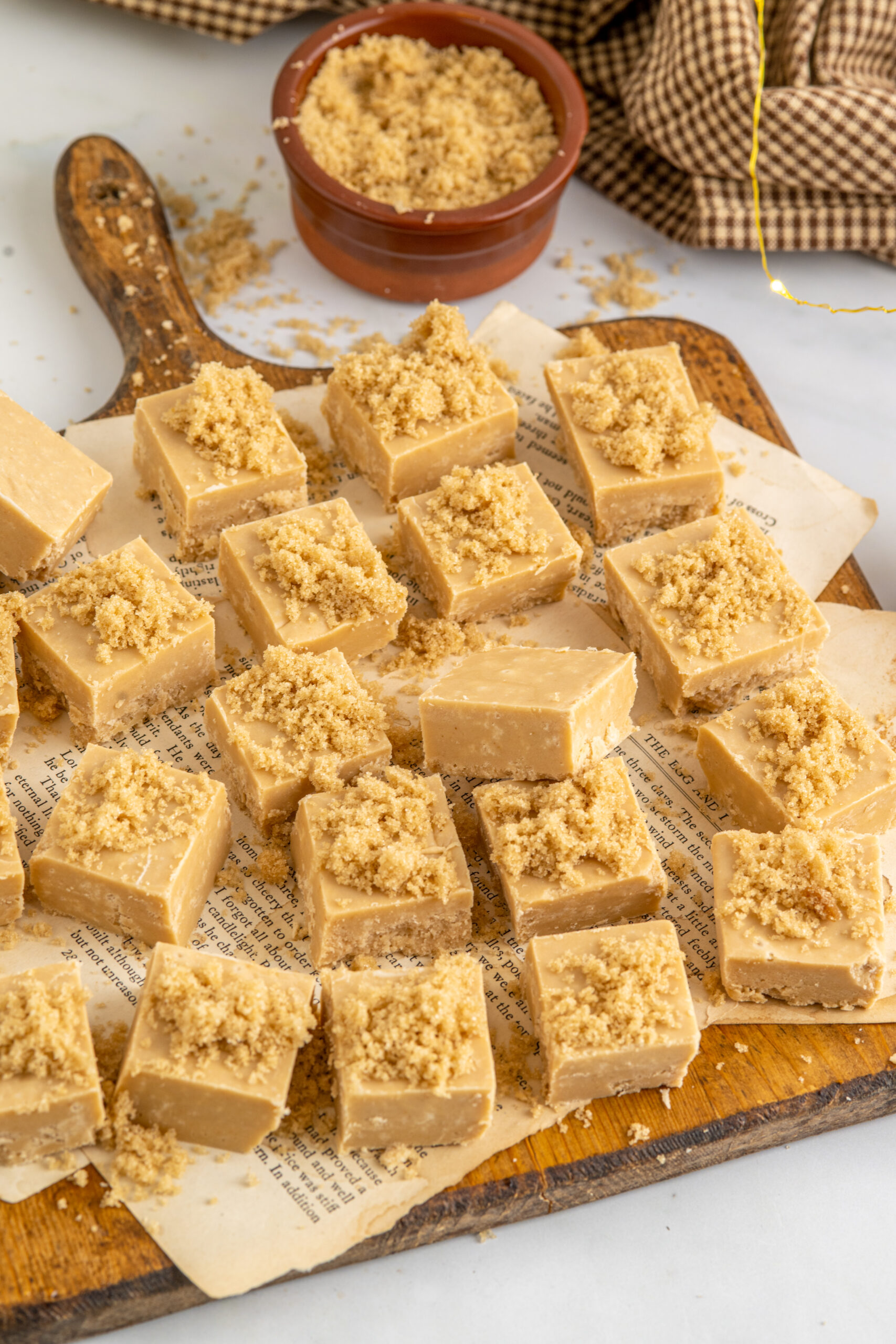 Overhead view of Penuche Fudge on a wooden board.