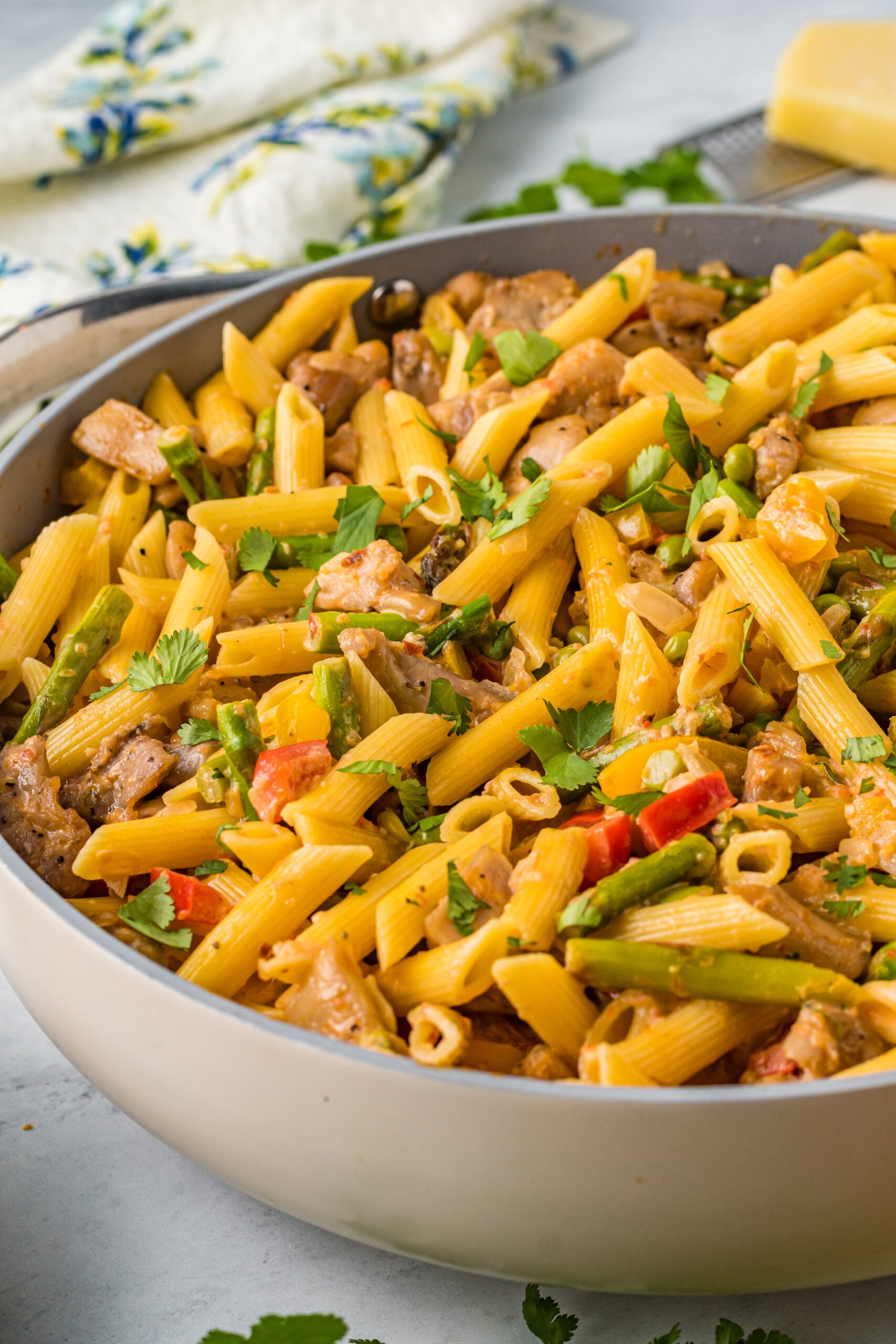 Side view of Cajun Chicken Pasta in a frying pan.