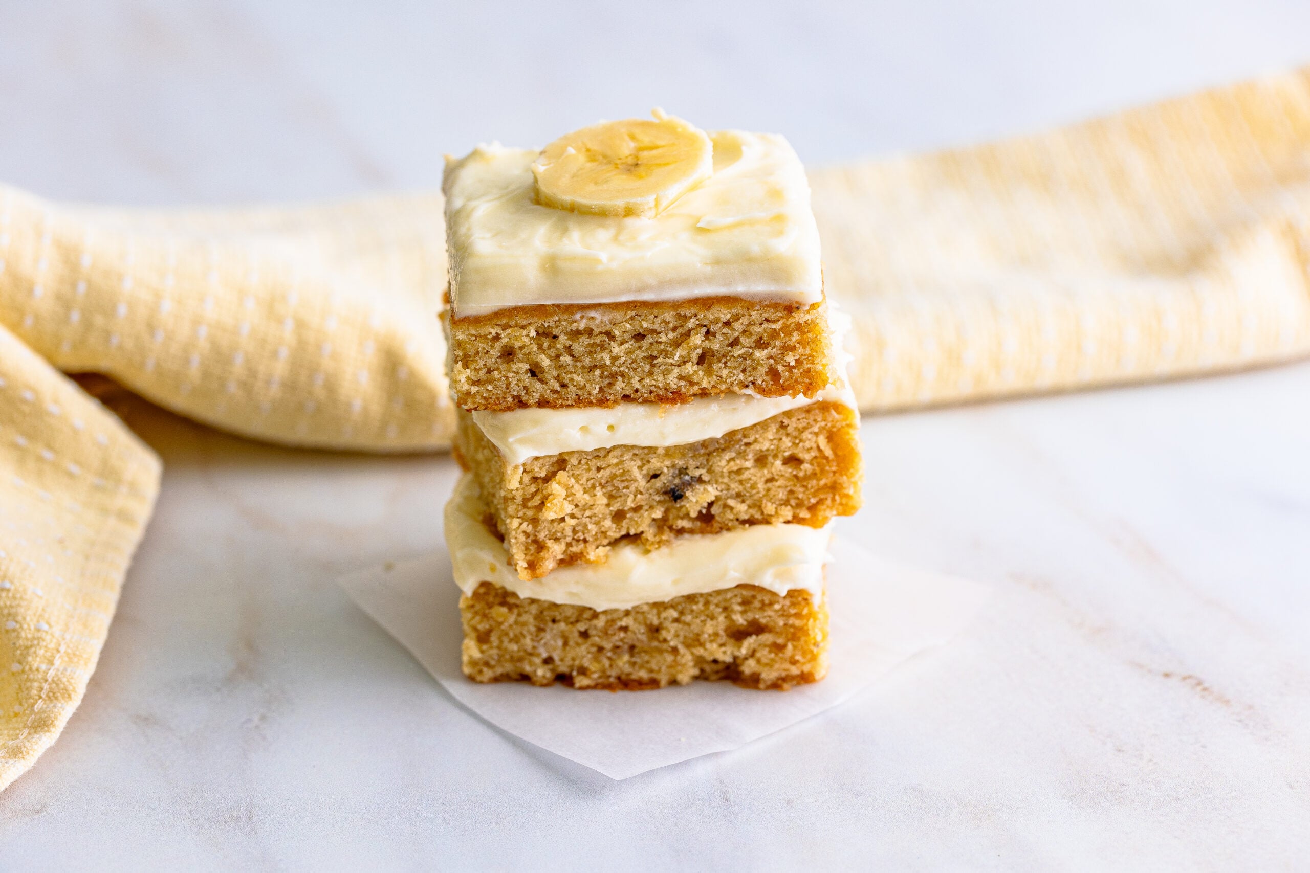 Front view of three Banana Brownies stacked.
