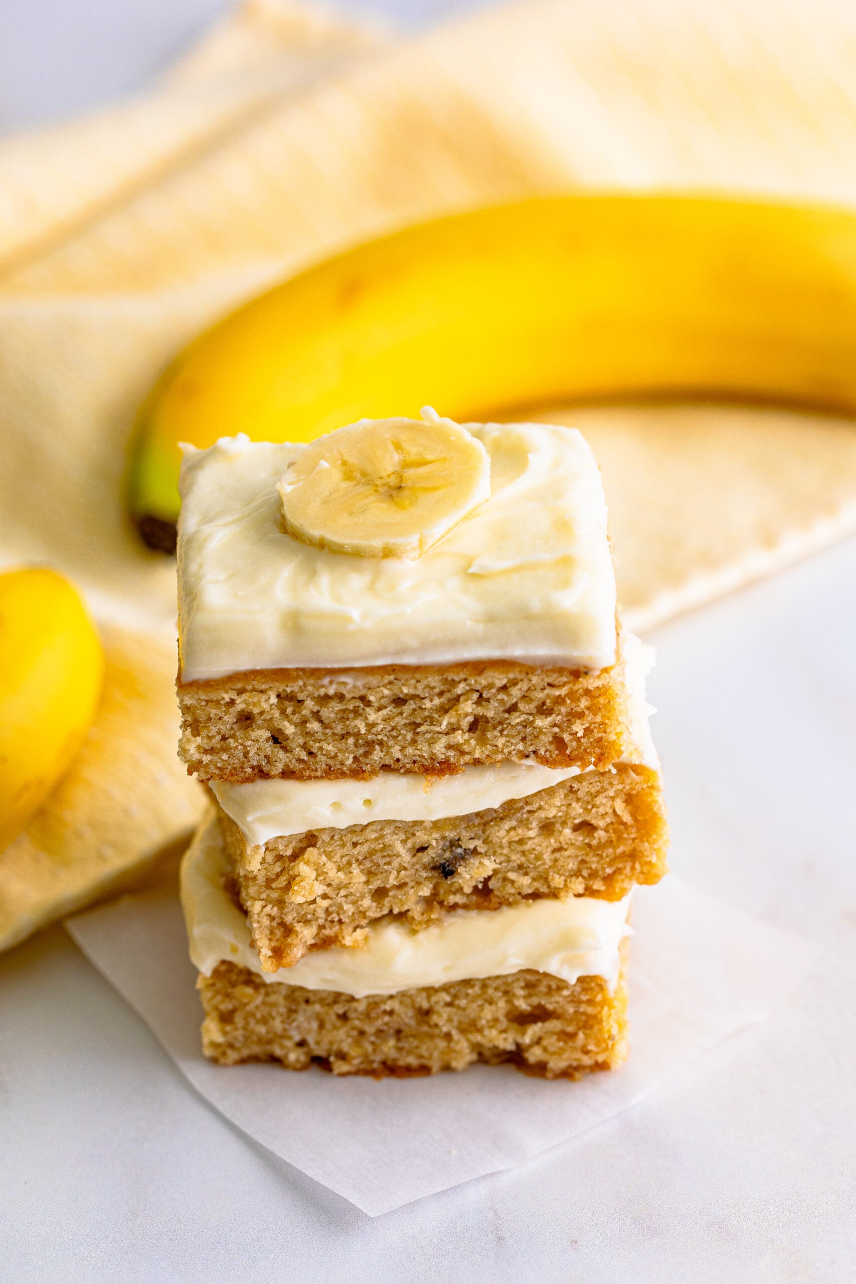 Front view of three Banana Brownies stacked.