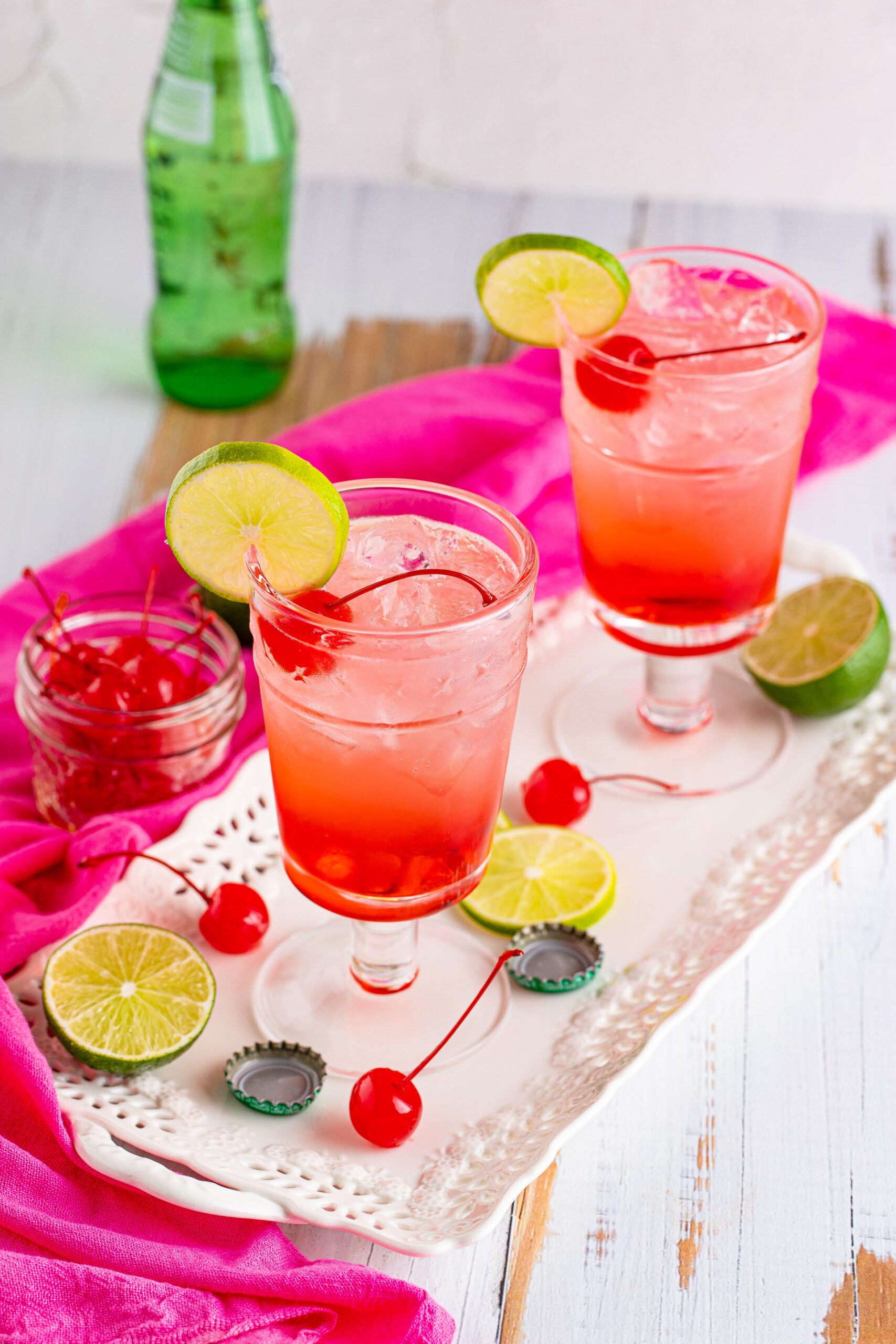 View of Dirty Shirley Temple garnished with a lime slice.