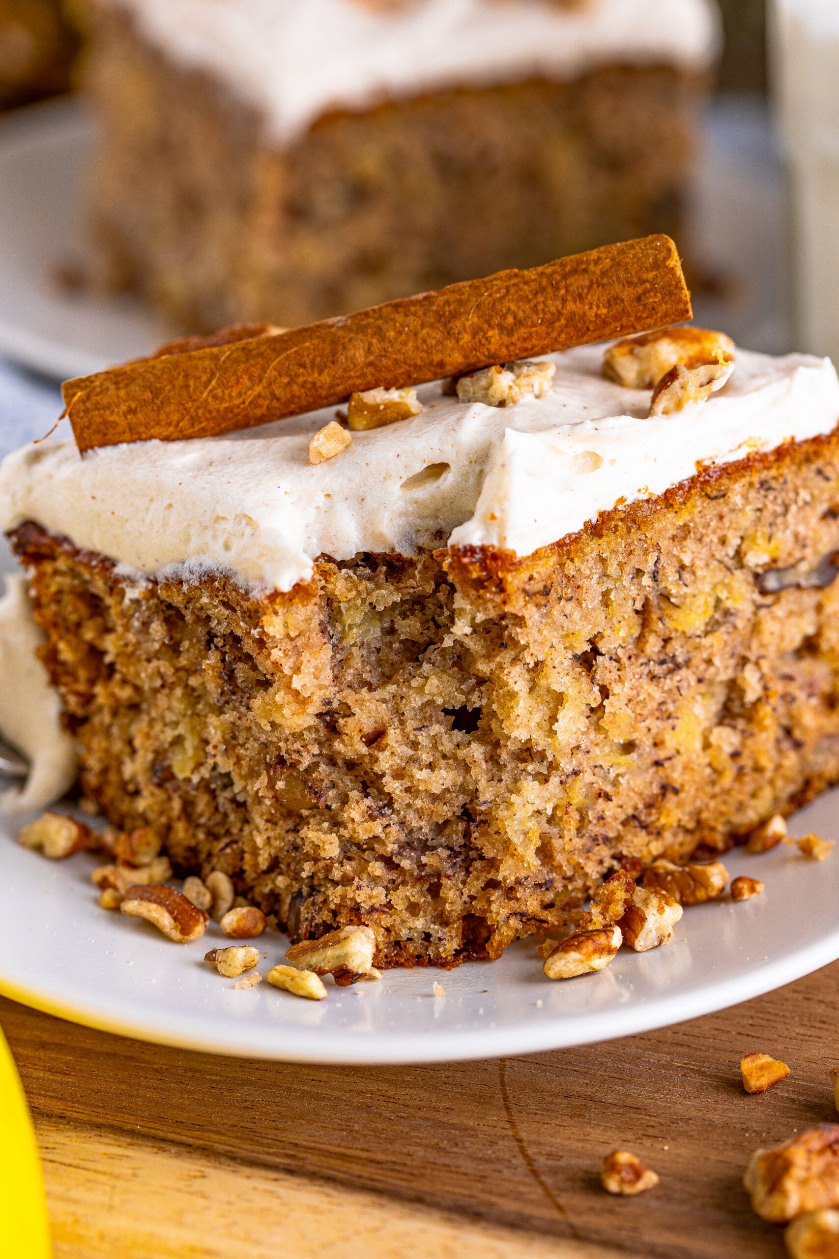 Hummingbird cake slice with a bite missing