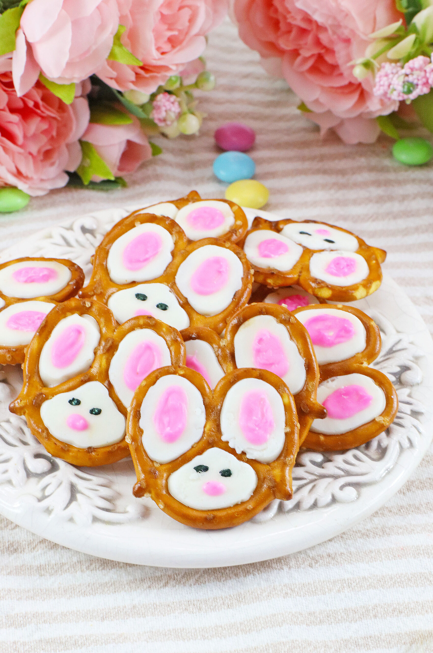 Front view of a pile of Bunny Pretzels on a white dish.