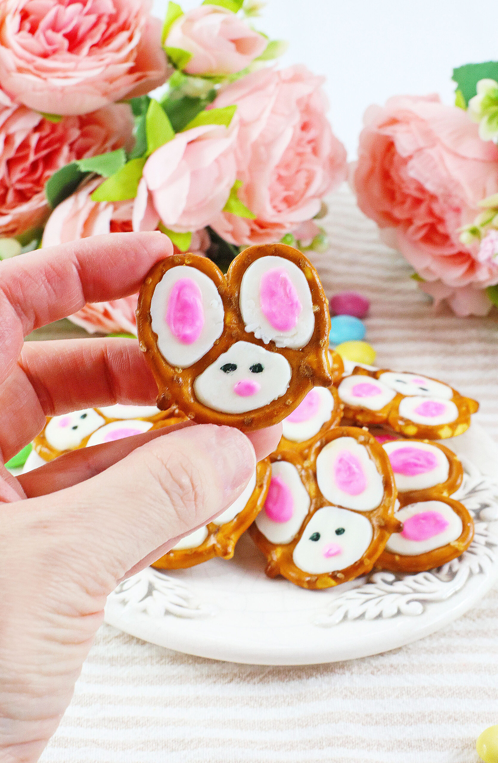Front view of a Bunny Pretzel being held.