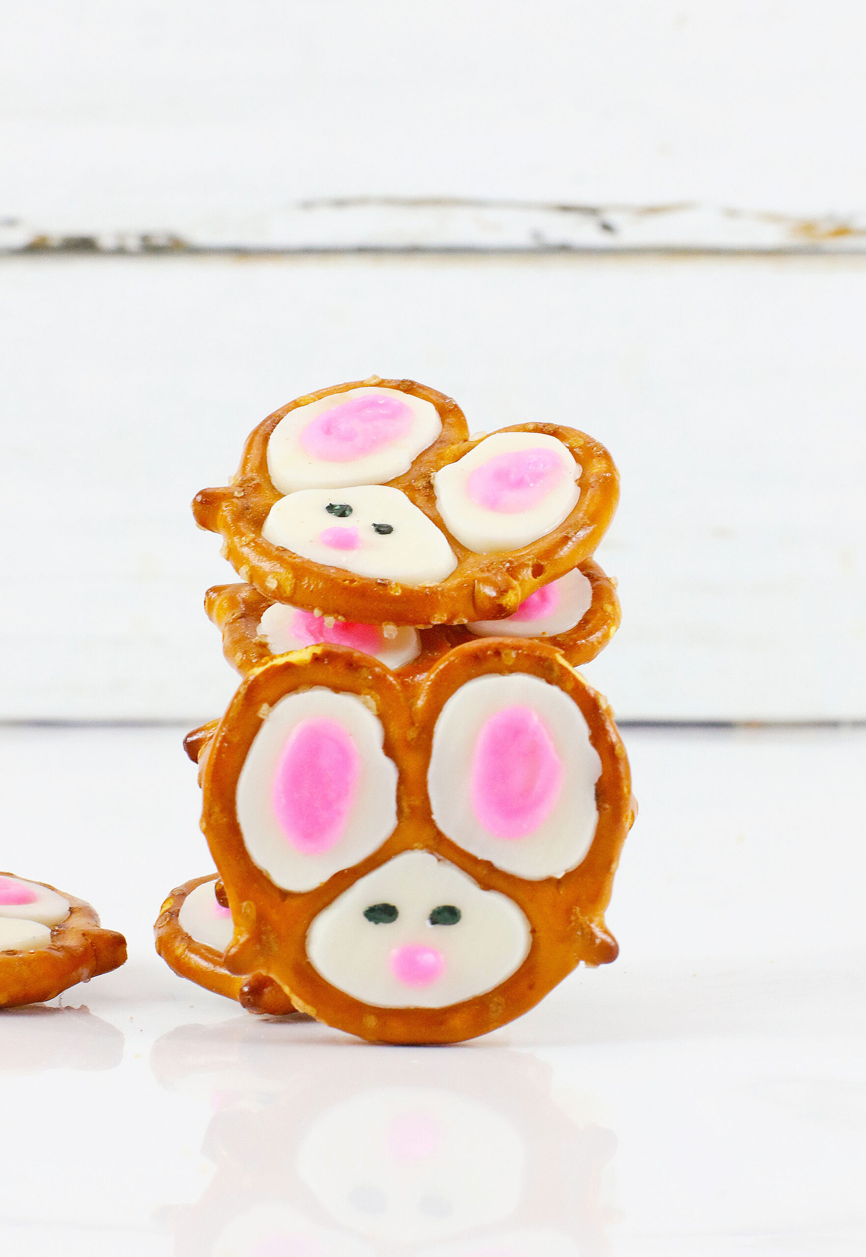 Front view of Bunny Pretzels stacked with one in front of the stack.