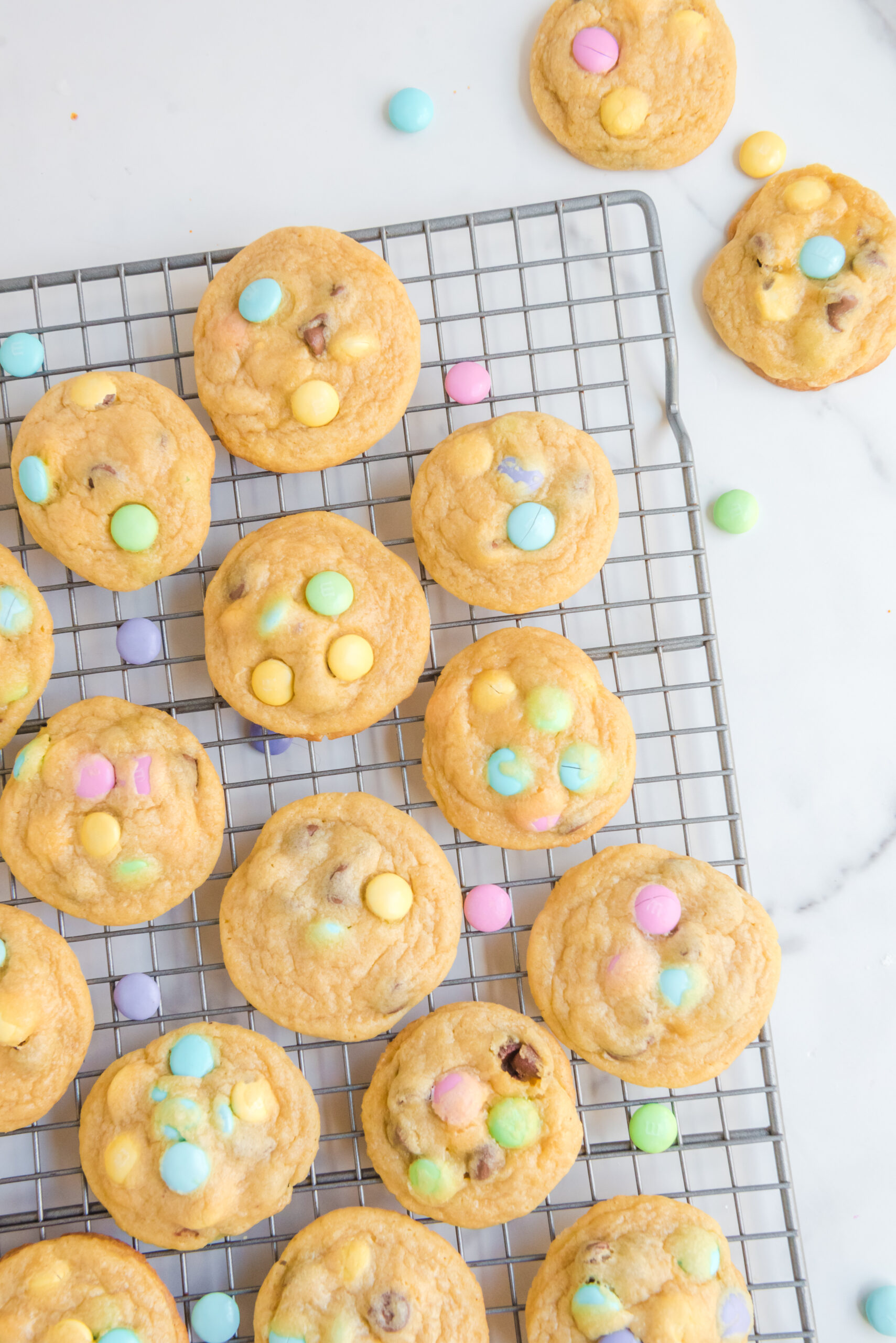 Overhead view of Easter Pudding Cookies on a wire rack.