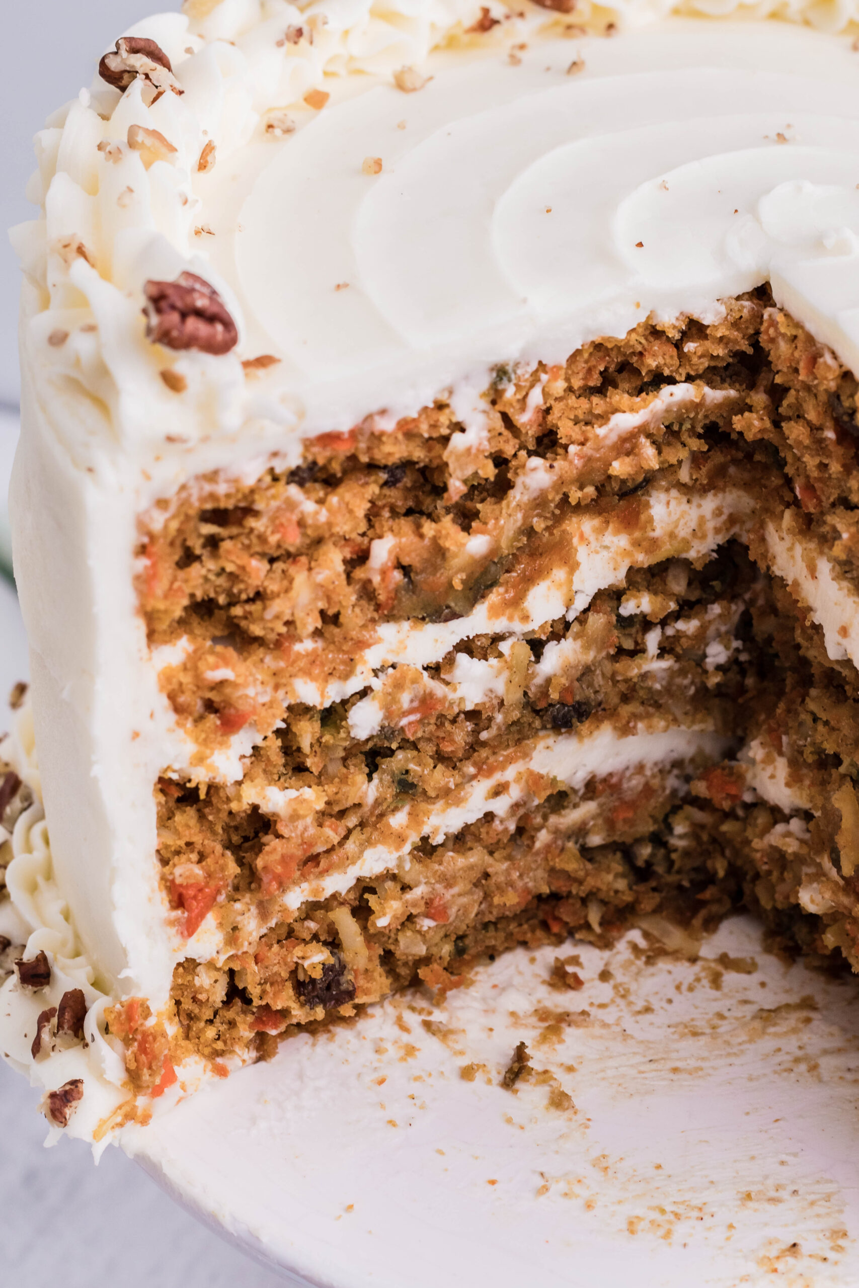 Front view of of Carrot Cake with two slices removed.