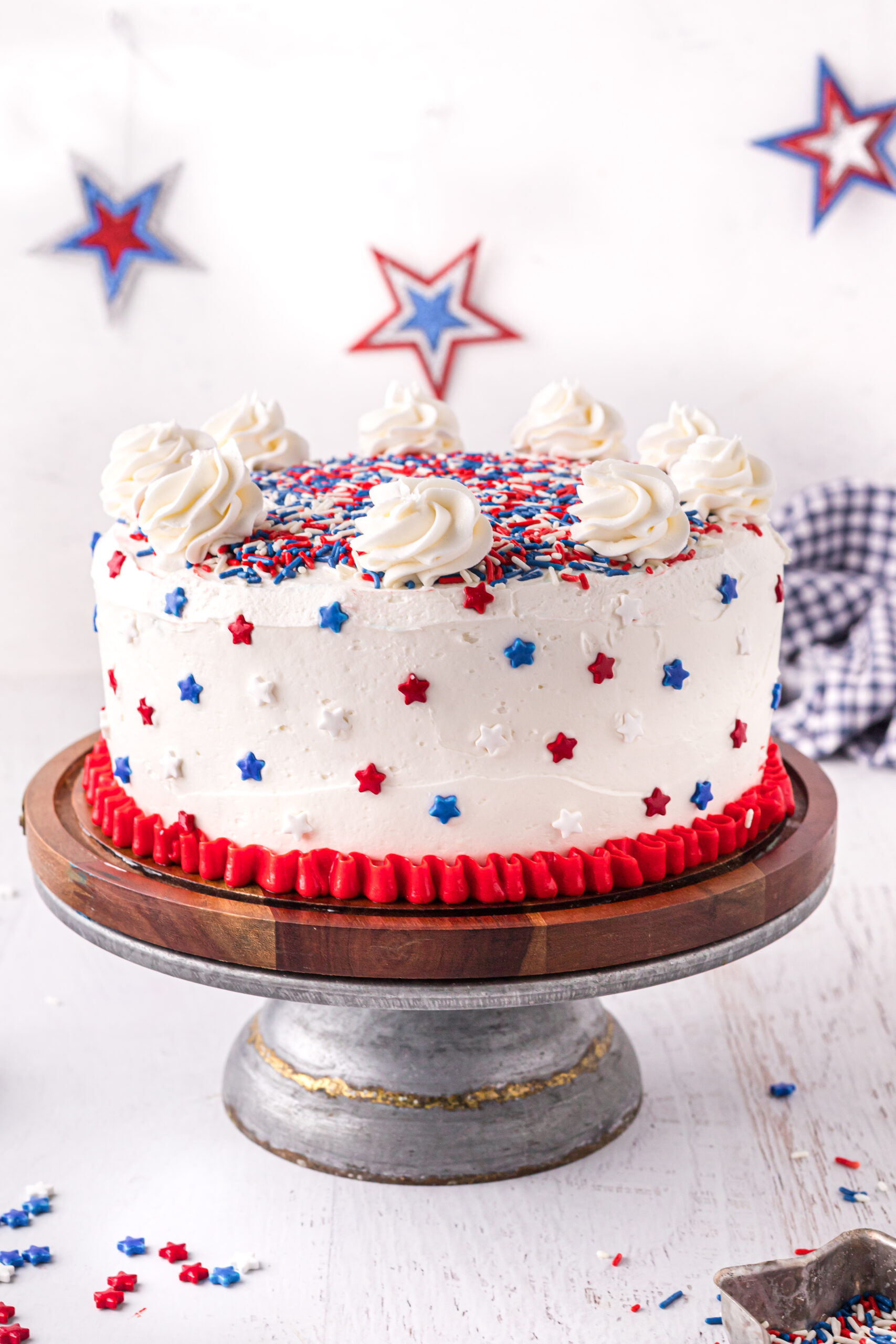 Front view of 4th of July Cake on a wood cake stand.