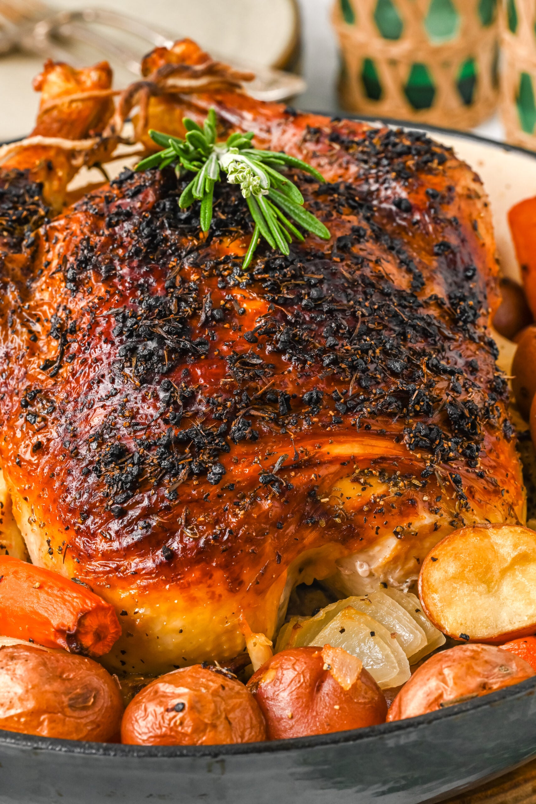Close up view of Oven Baked Chicken and Vegetables in a baking dish.