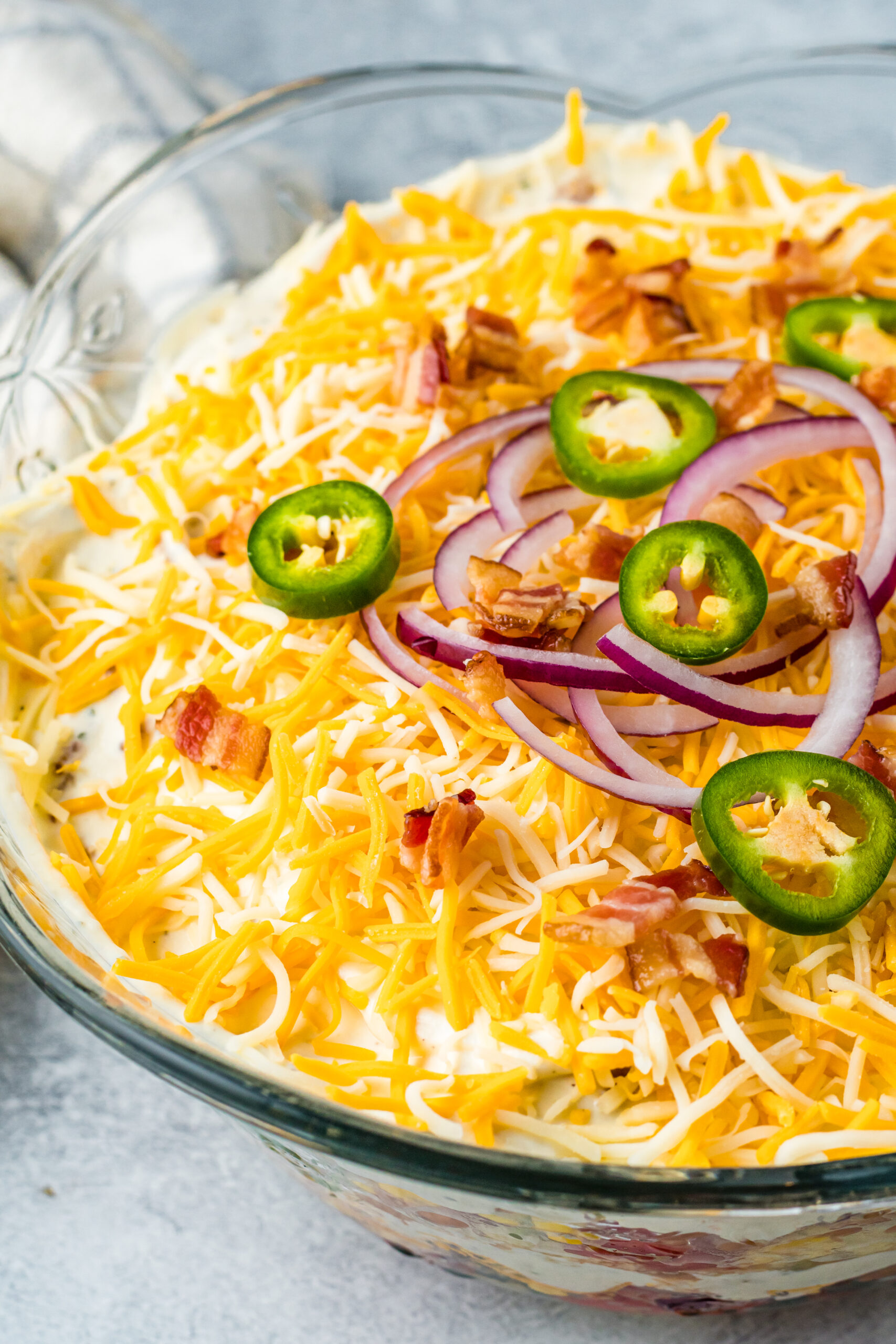 Close up view of Cornbread Salad in a glass bowl.