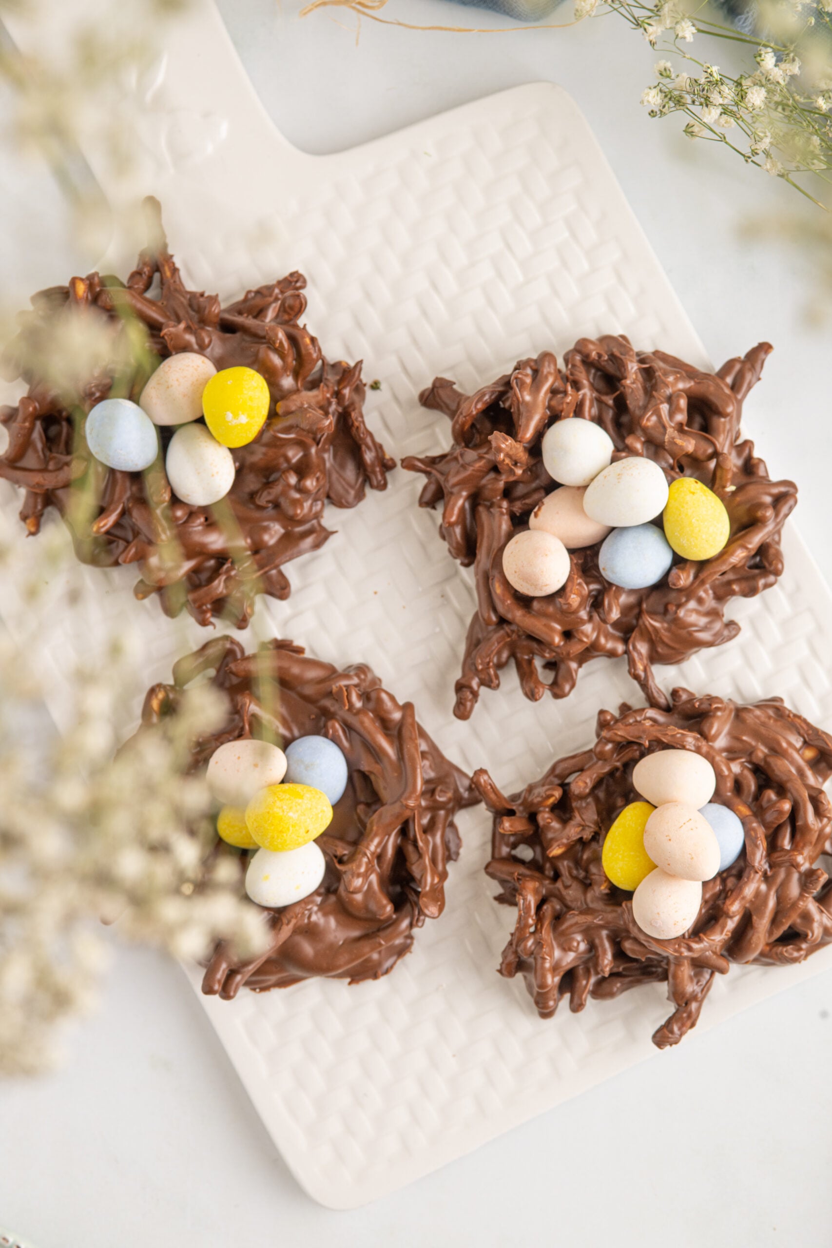 Overhead shot of Birds Nest Cookies on a white serving tray.