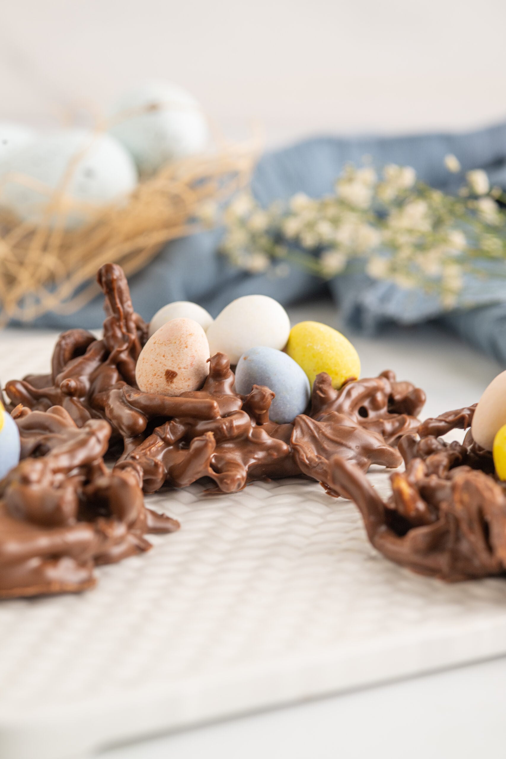 Side Close up of Birds Nest Cookies on a white serving tray.