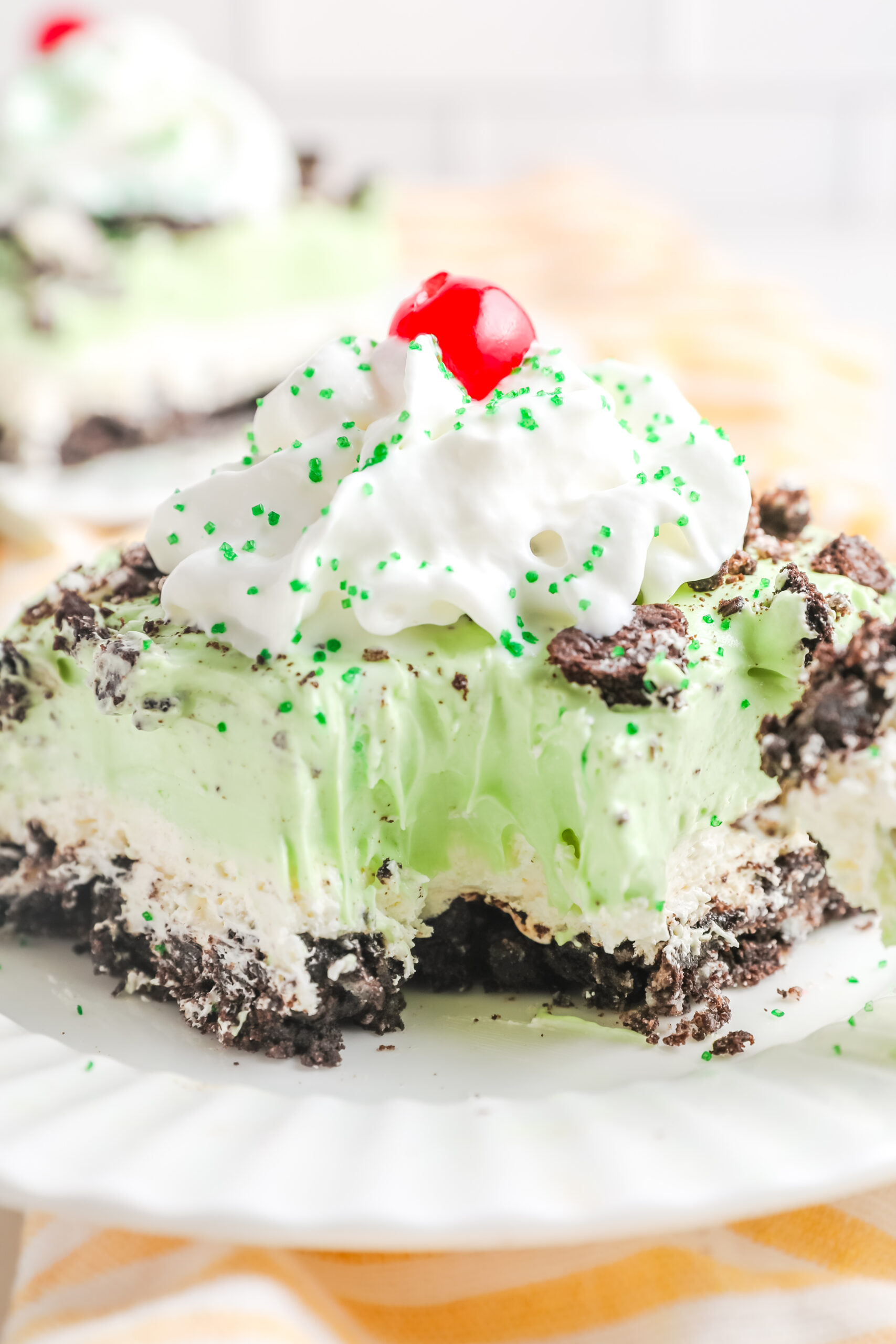 Up close view of a bite removed from a piece of Shamrock Lasagna.
