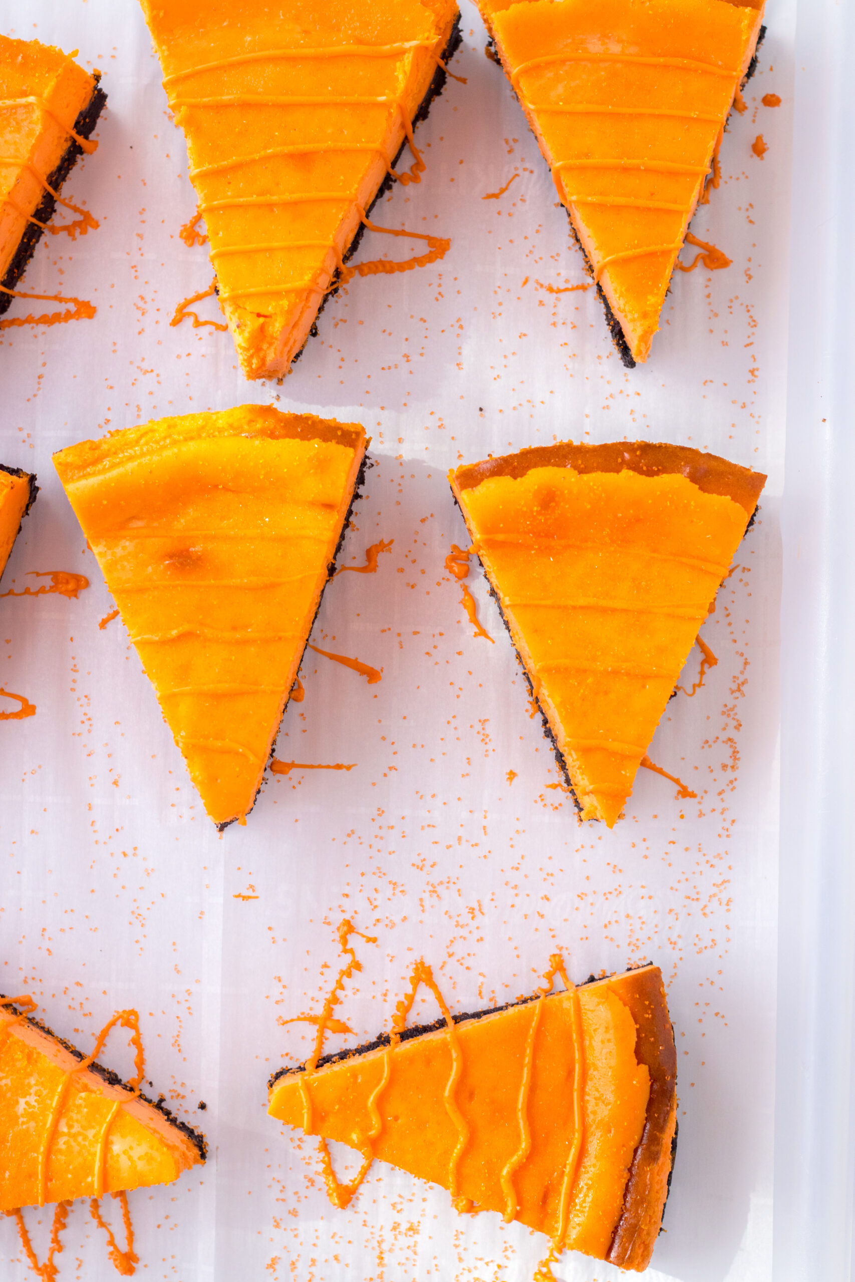 Overhead view of the drizzle going on the cheesecake carrots.