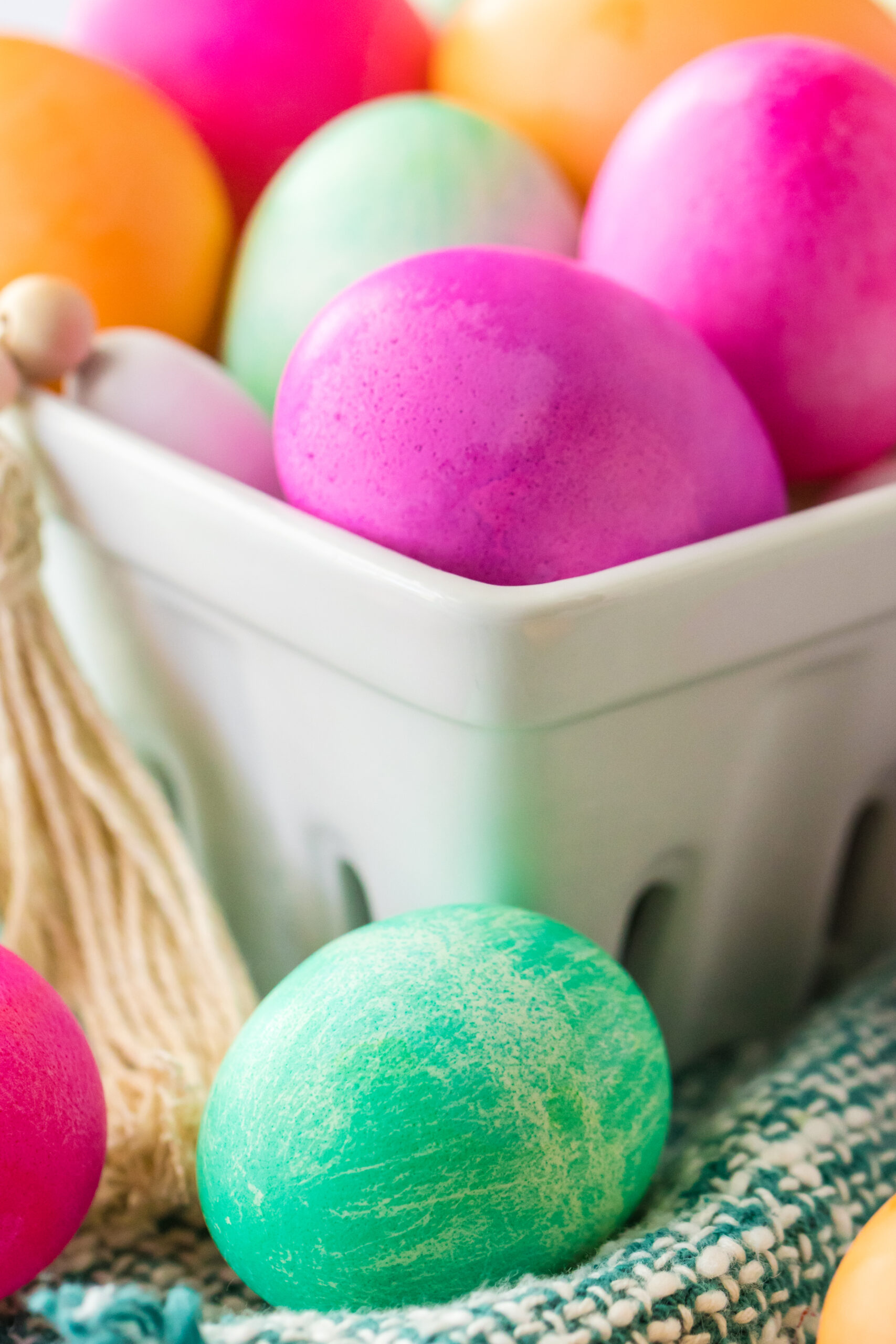 Close up view of a teal slower cooker dyed Easter egg.