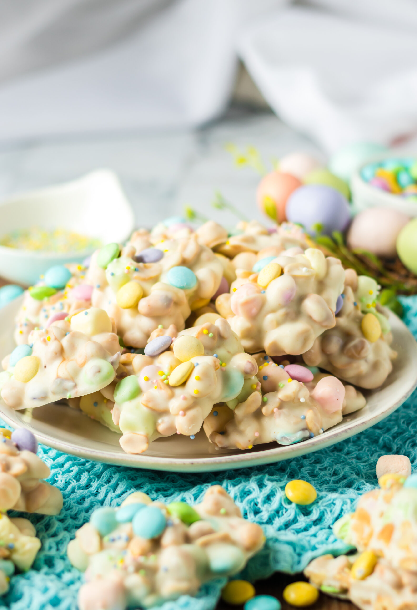 Side view of the stacked candy on a white plate.