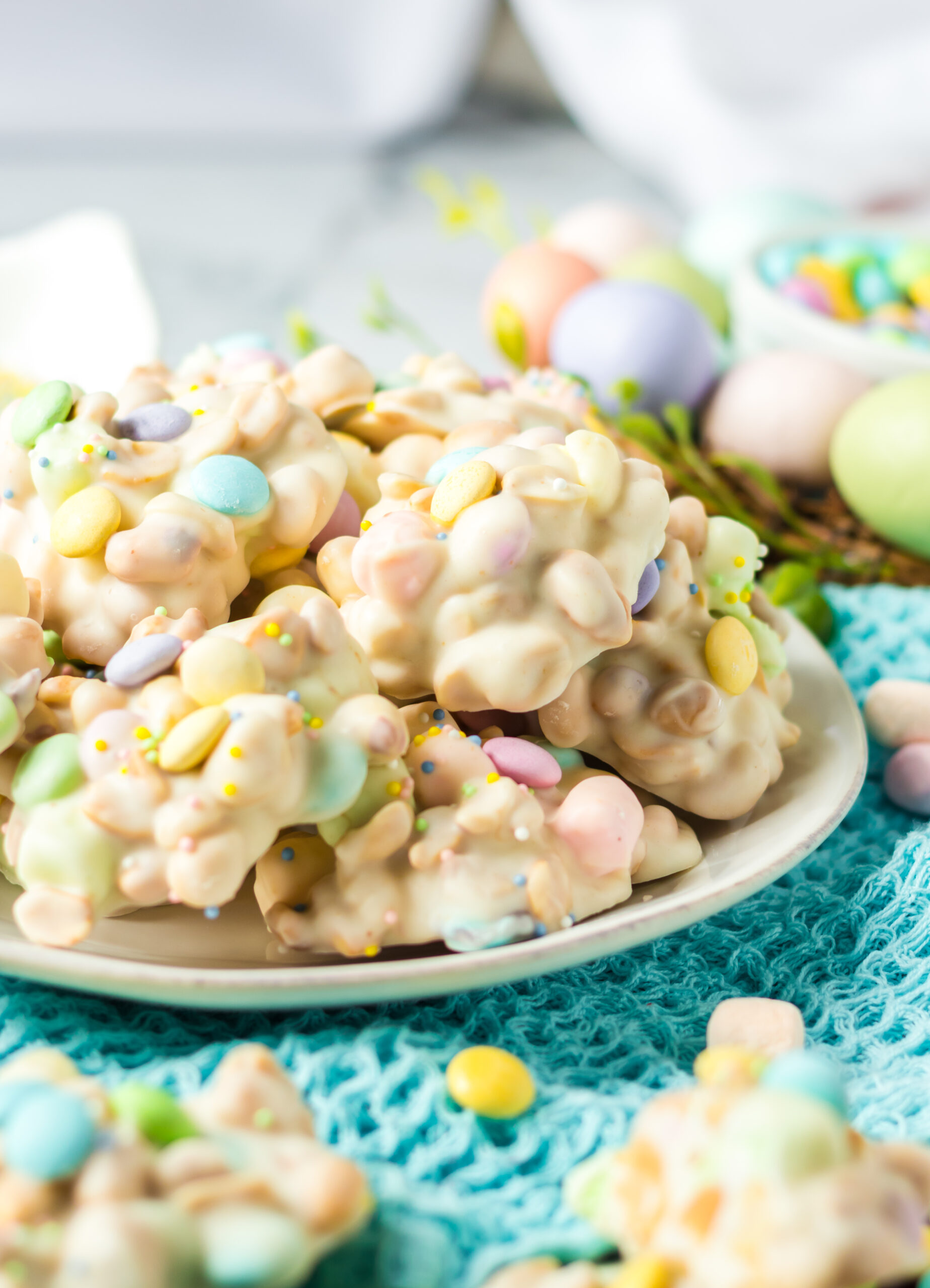 Side view of the stacked candy on a white plate.