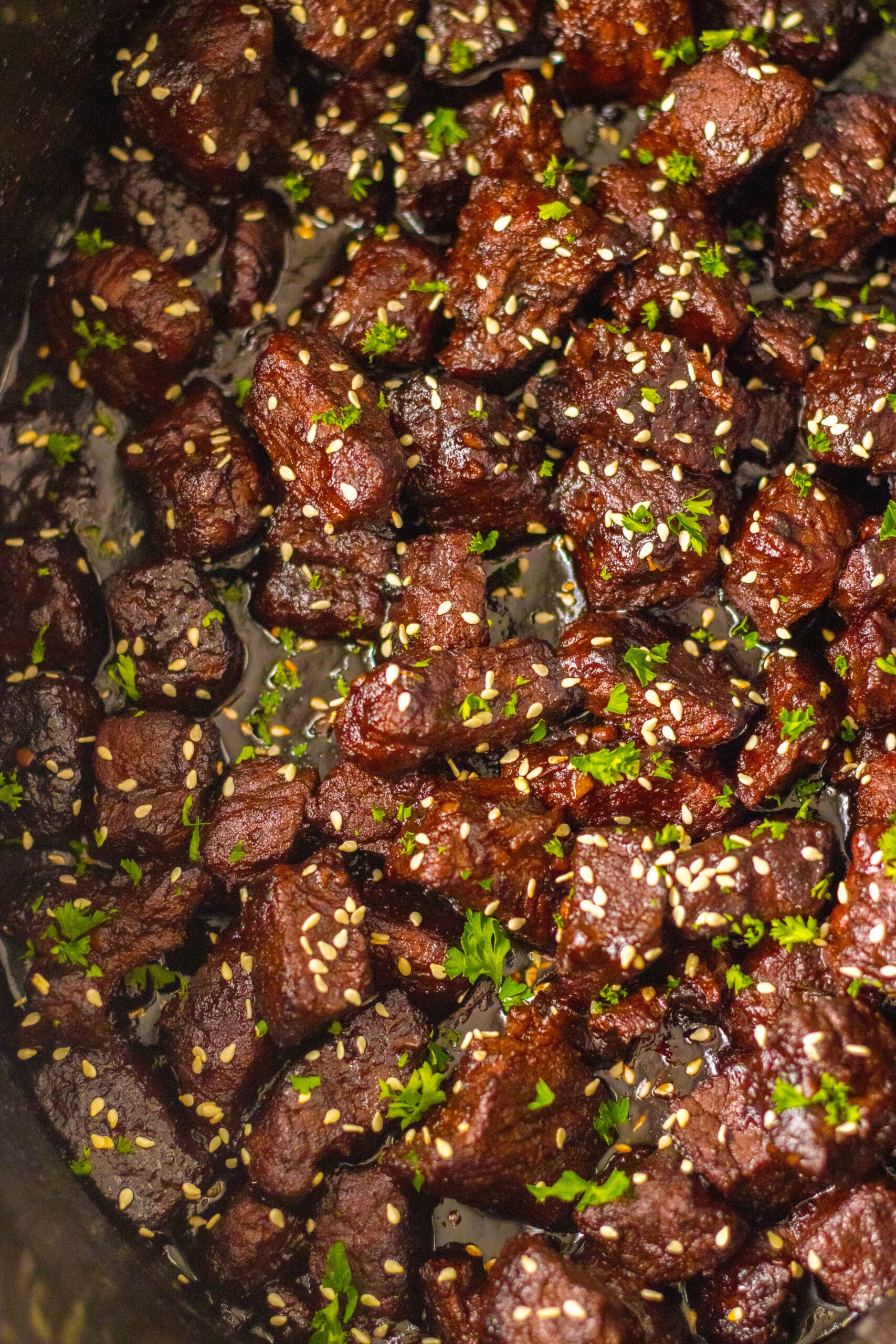 Close up view of Slow Cooker Honey Garlic Steak Bites.