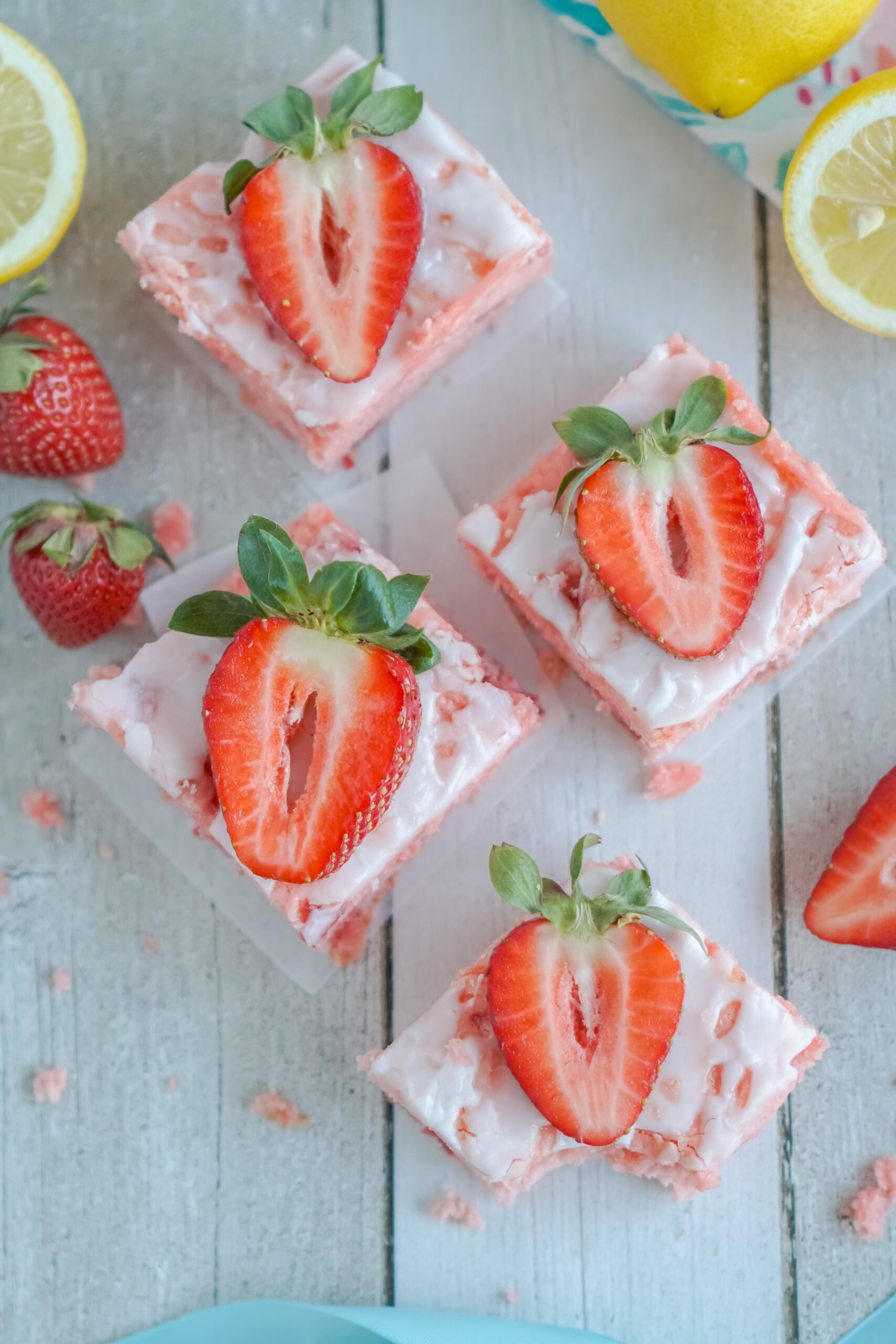 Overhead view of Strawberry Lemon Brownies on parchment paper.