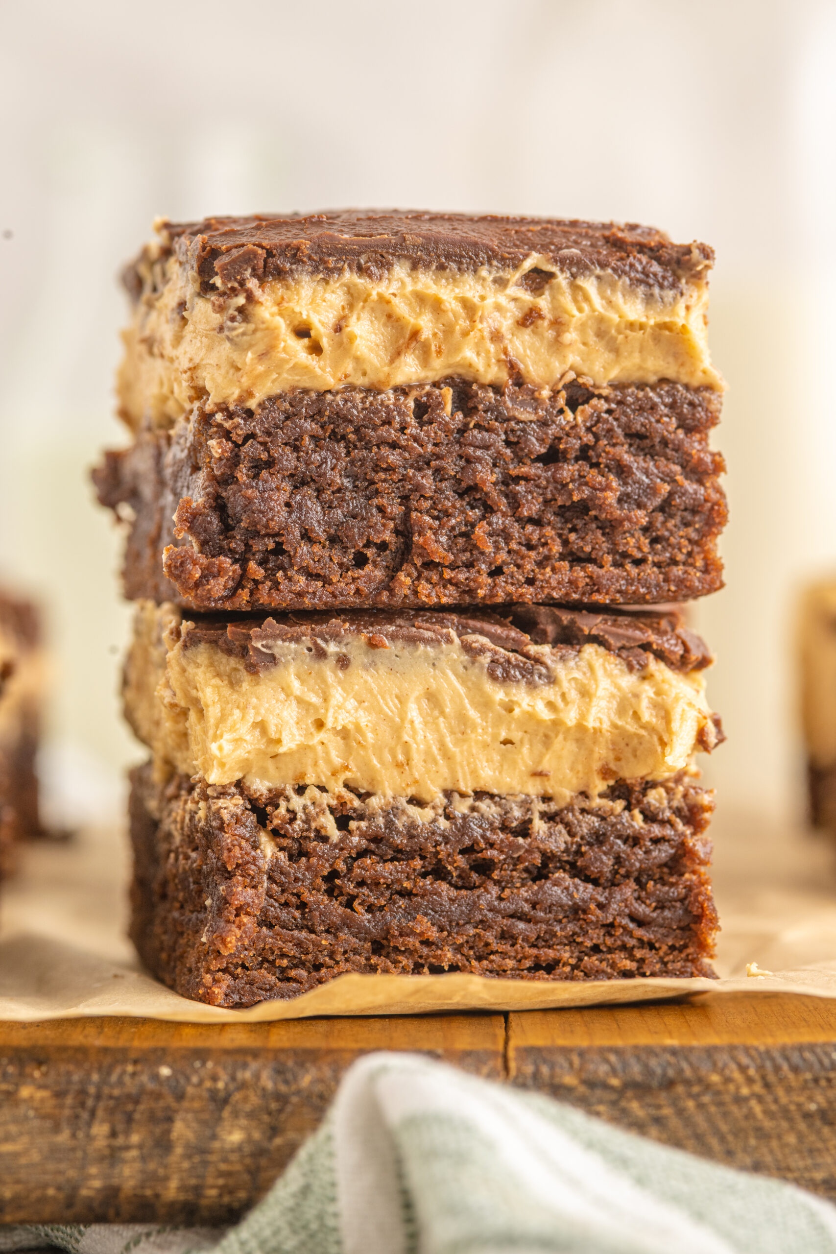 Up close shot of two Buckeye Brownies stacked on top of each other. 