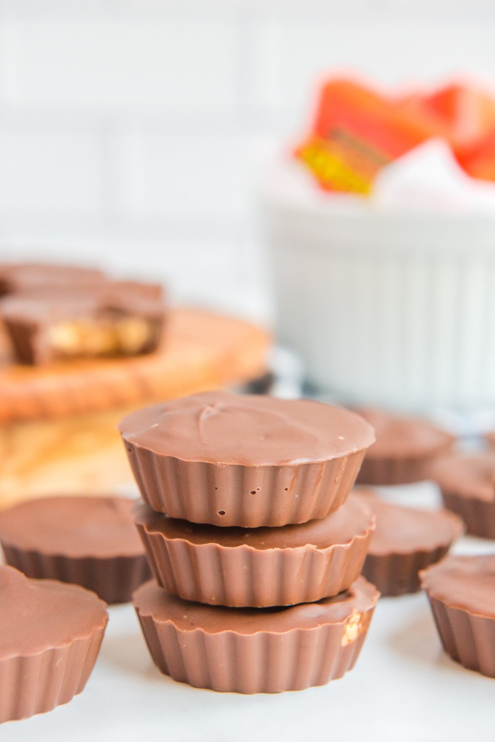 Three Homemade Reese's Peanut Butter Cups stacked on top of each other.