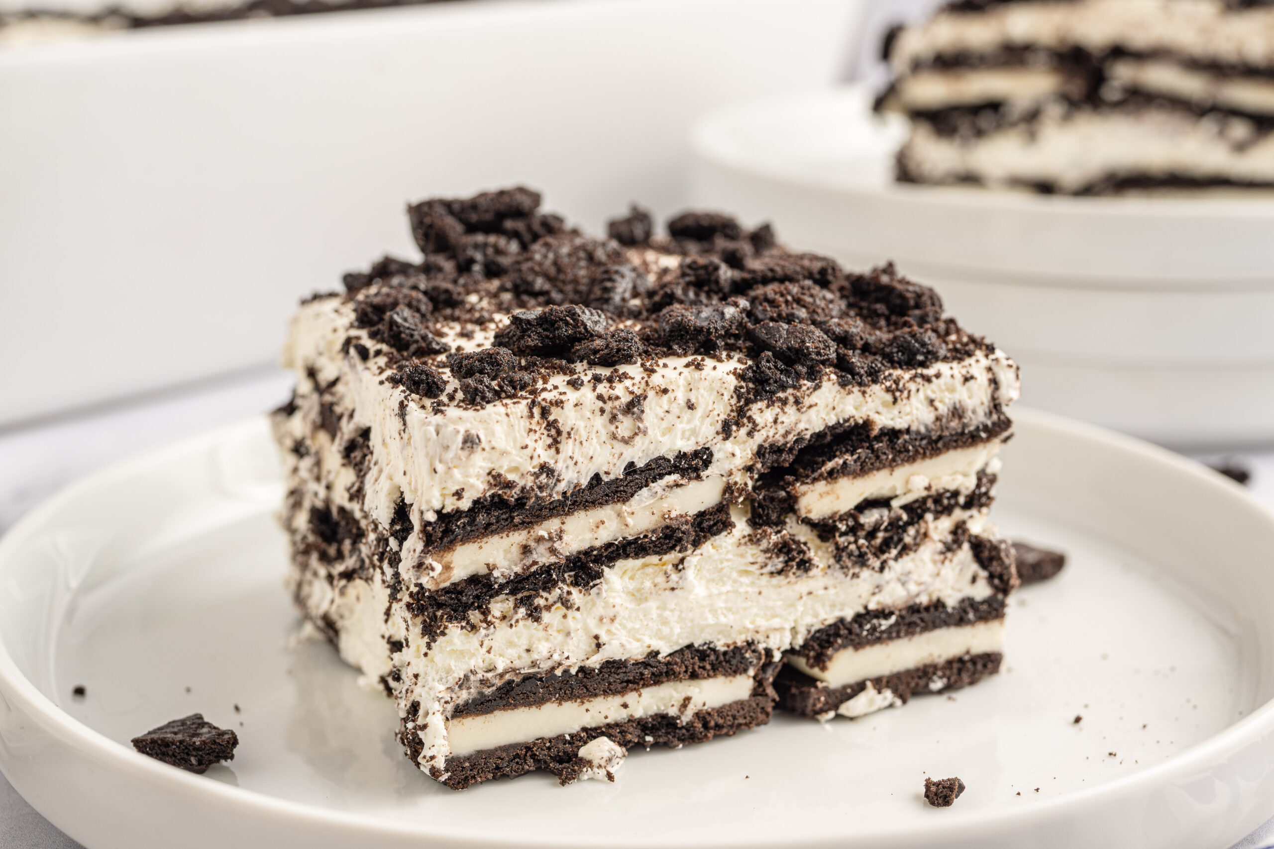Slice of the Oreo Icebox Cake on a white plate