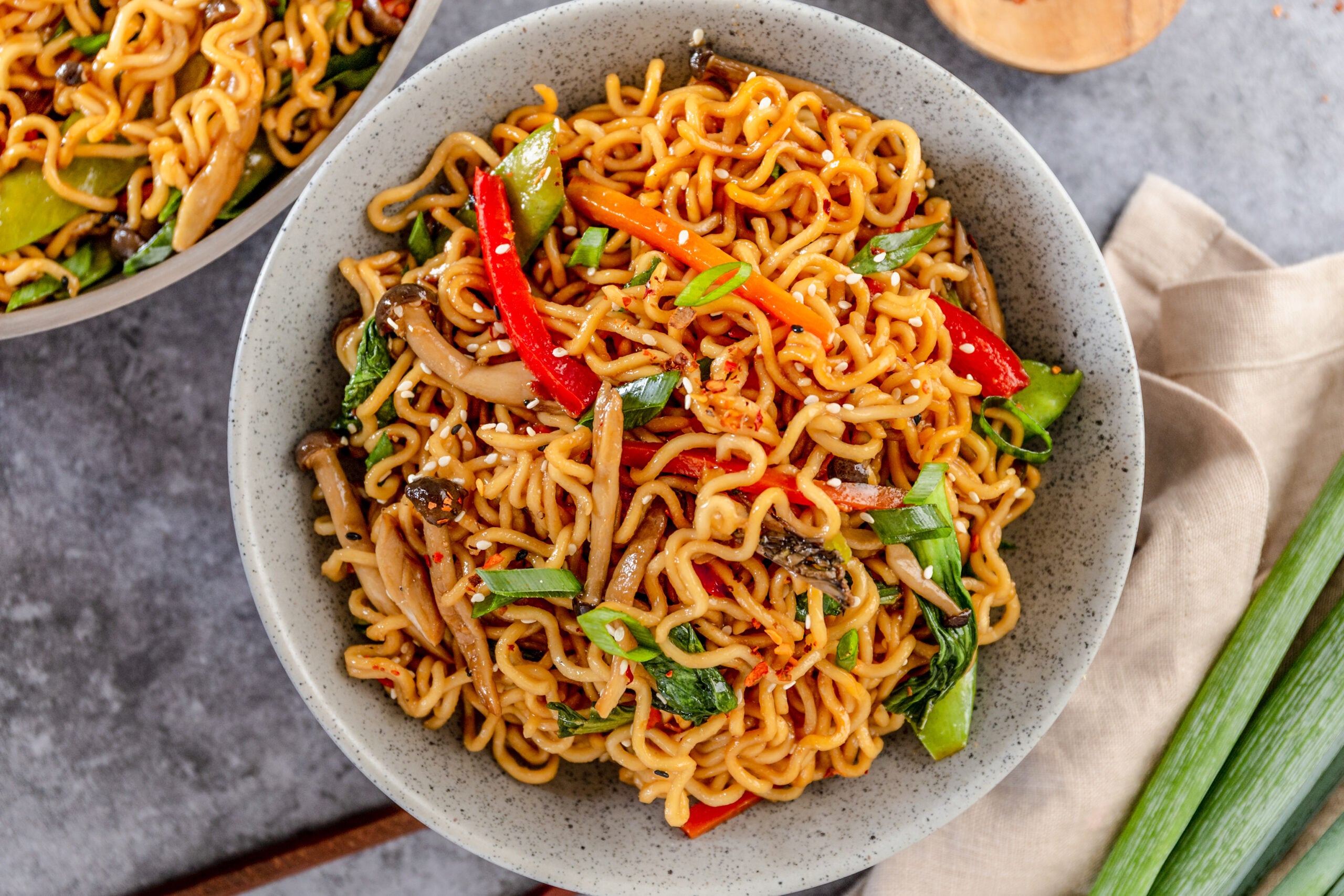 Ramen Stir Fry in a speckled white bowl.