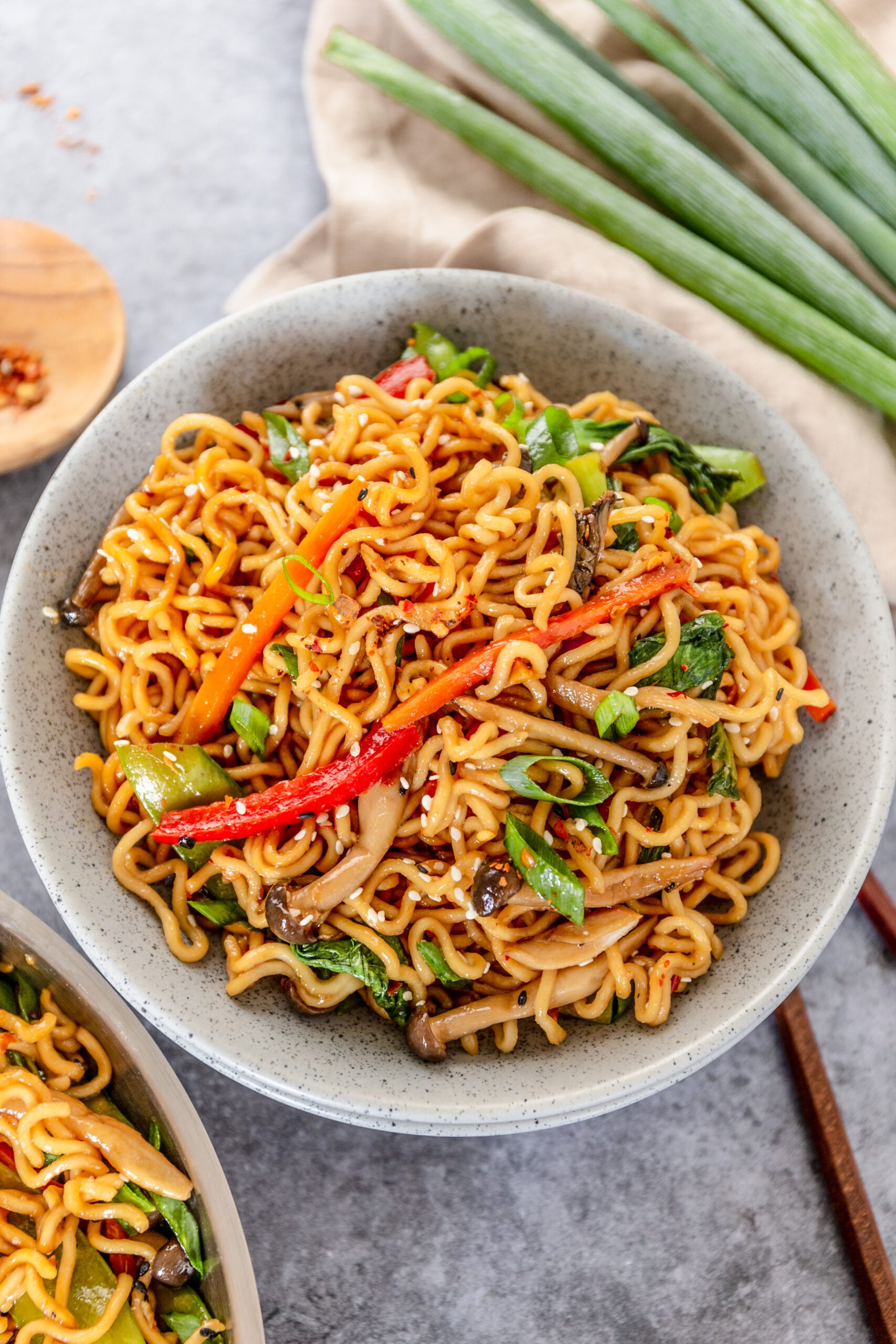 Ramen Stir Fry in a speckled white bowl.