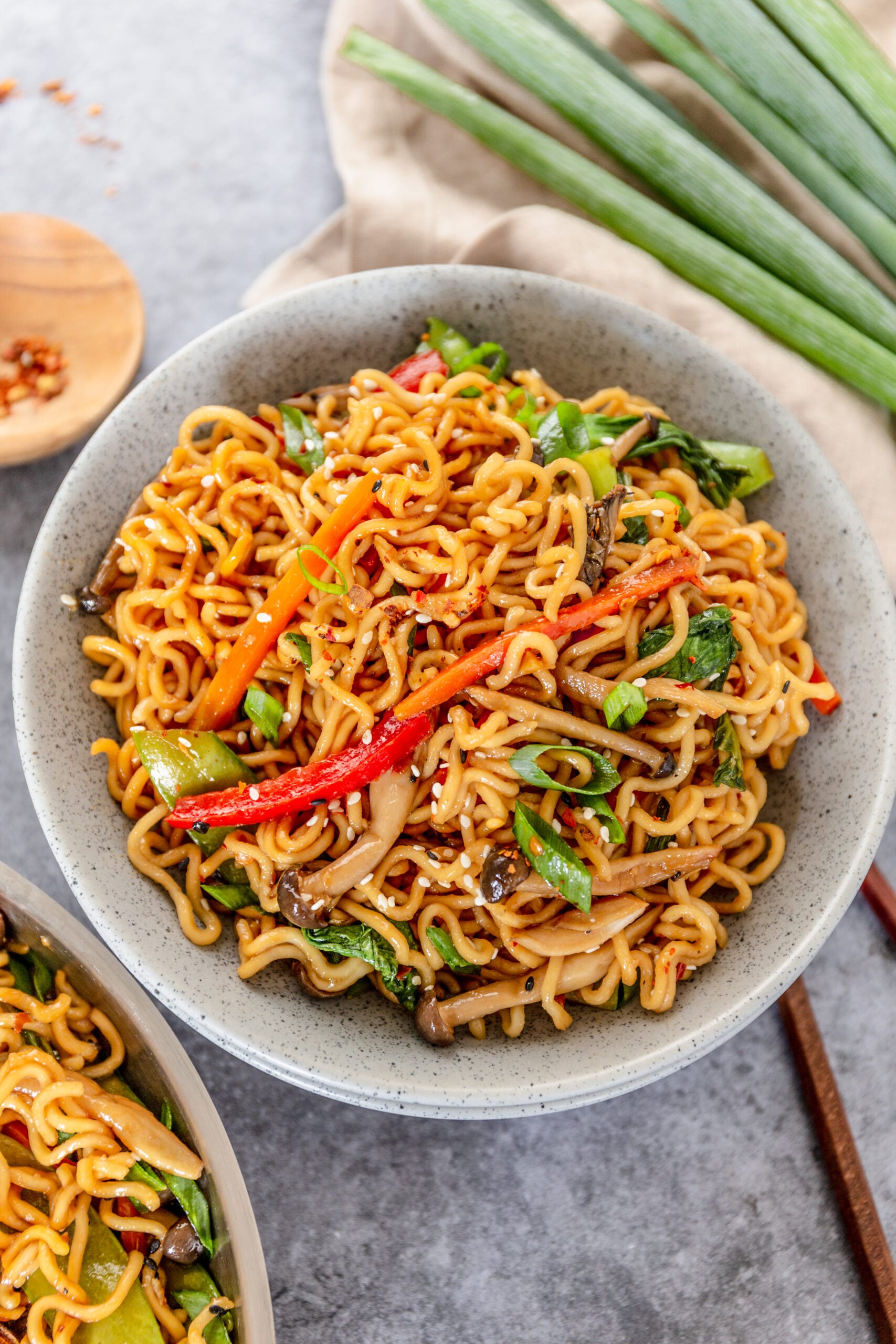 Ramen Stir Fry in a speckled white bowl.