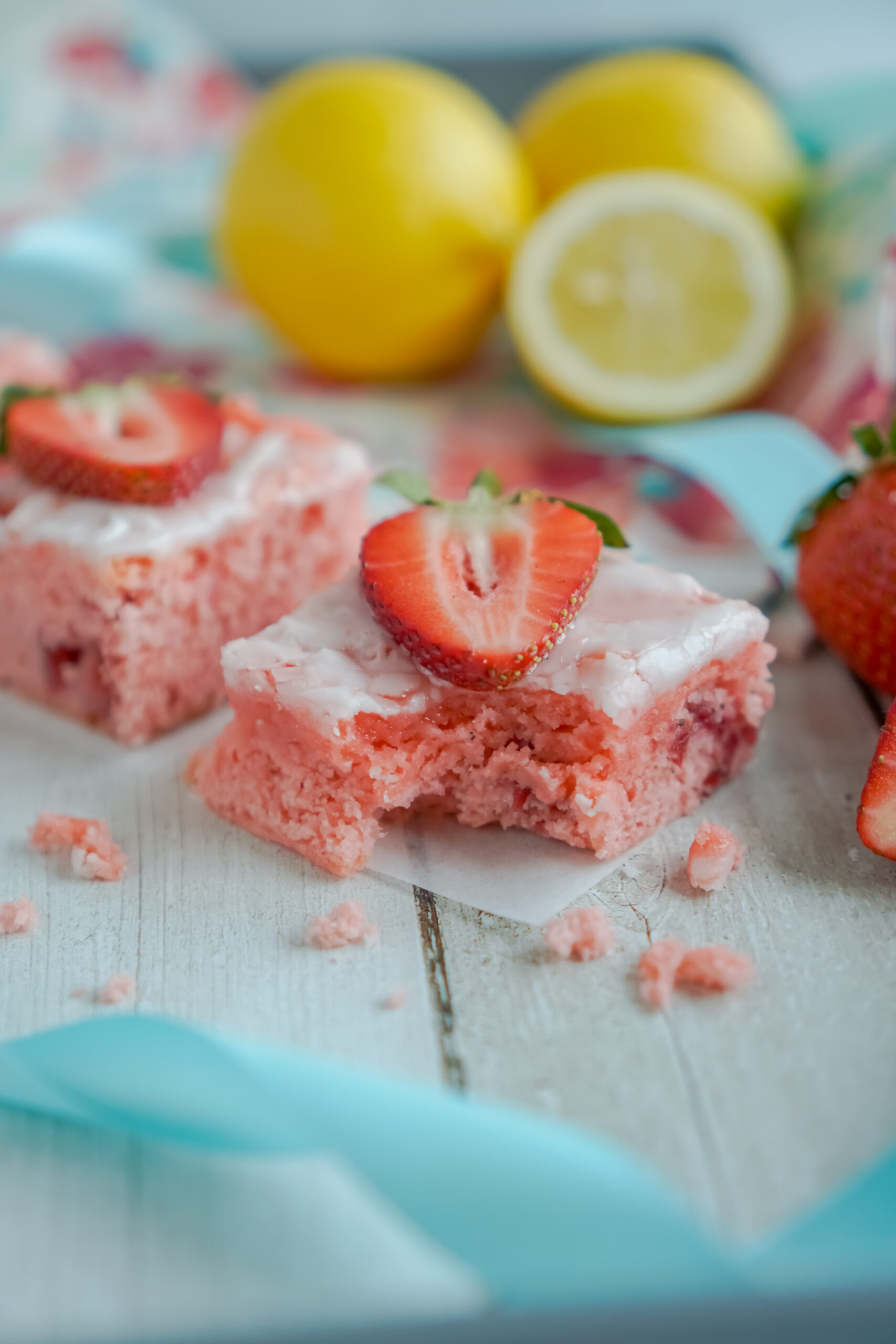 Front view of Strawberry Lemon Brownies on parchment paper.