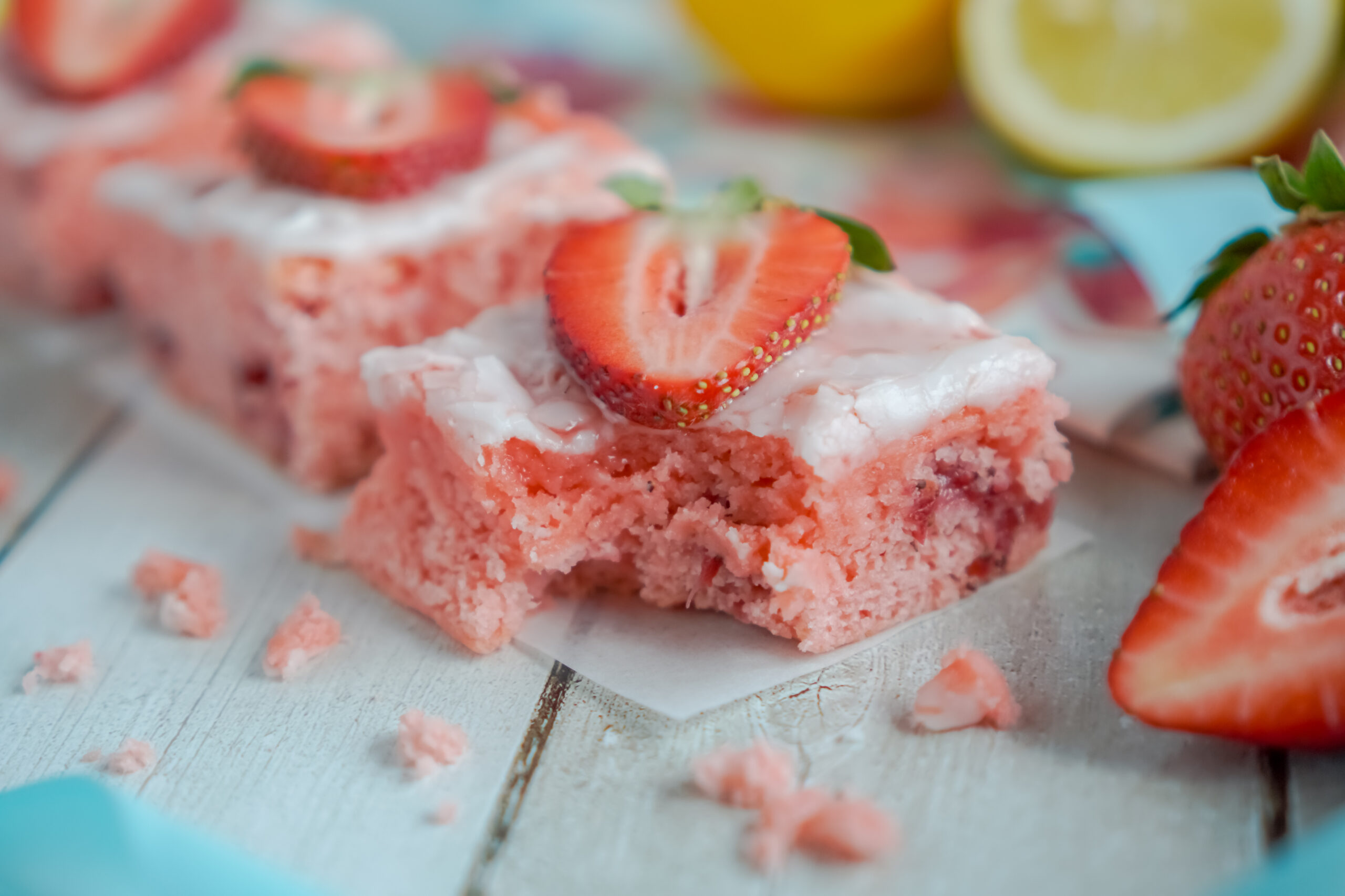 Strawberry Lemon Brownies side view with a bite removed