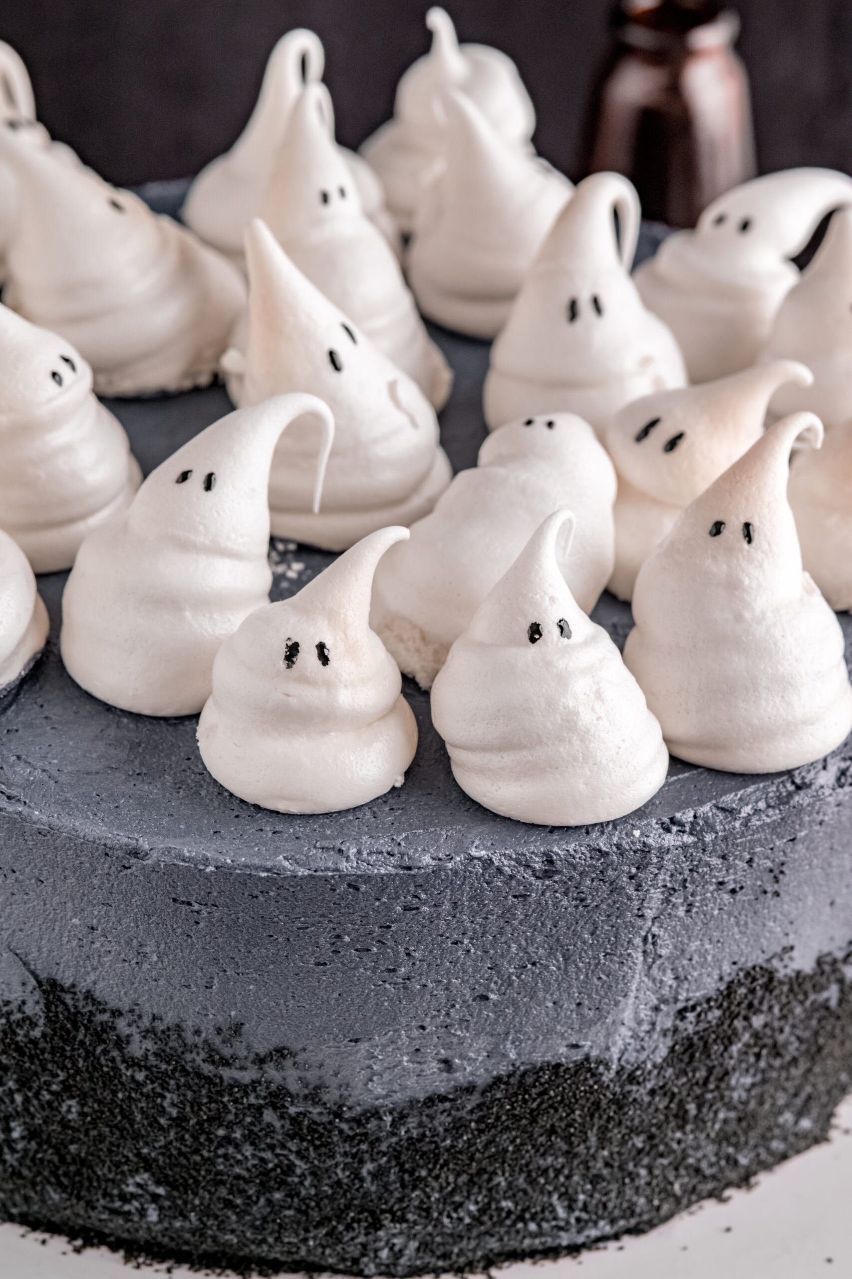 Close up of the meringue ghosts on the Halloween Cake.
