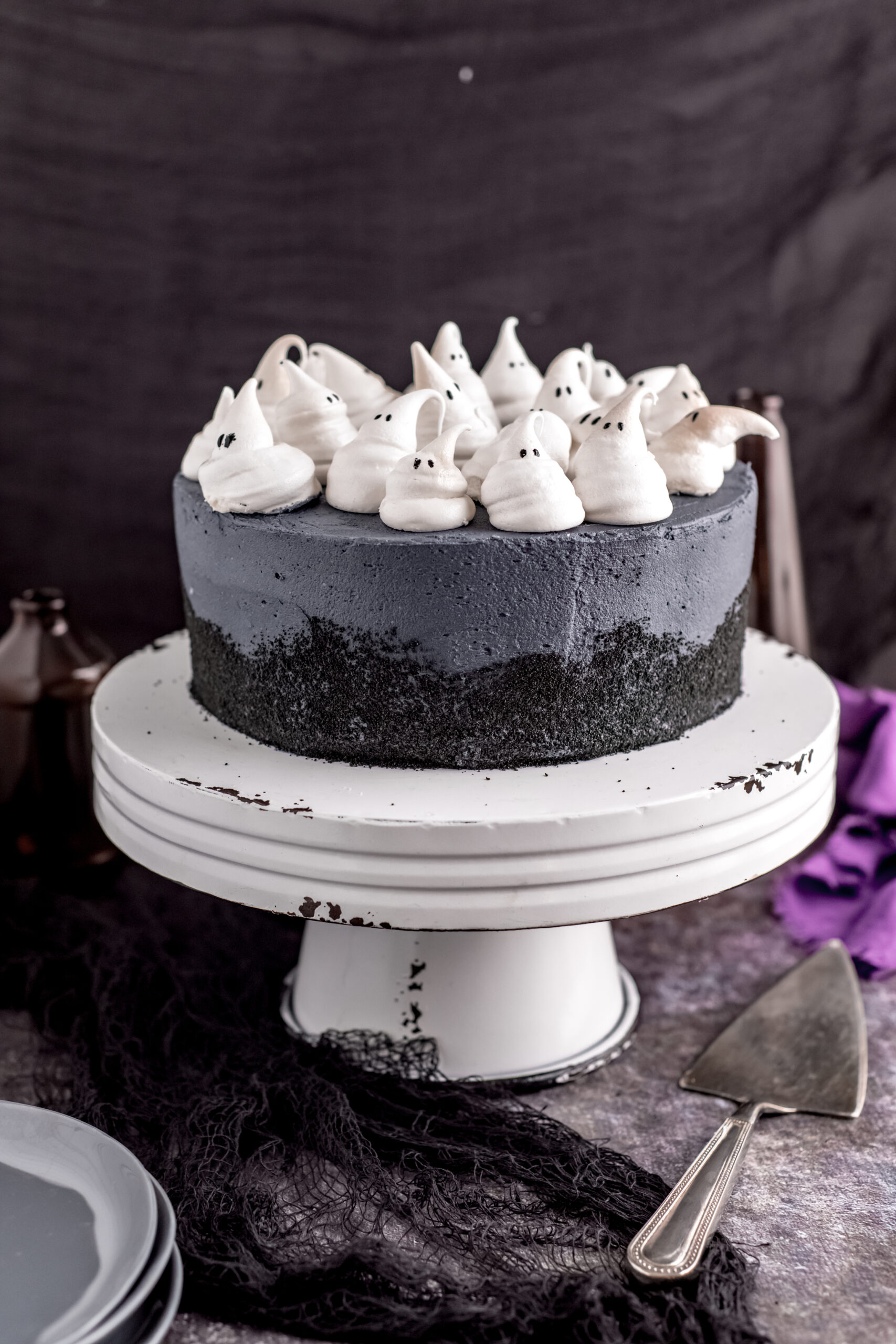 Halloween Cake on a white distressed stand.