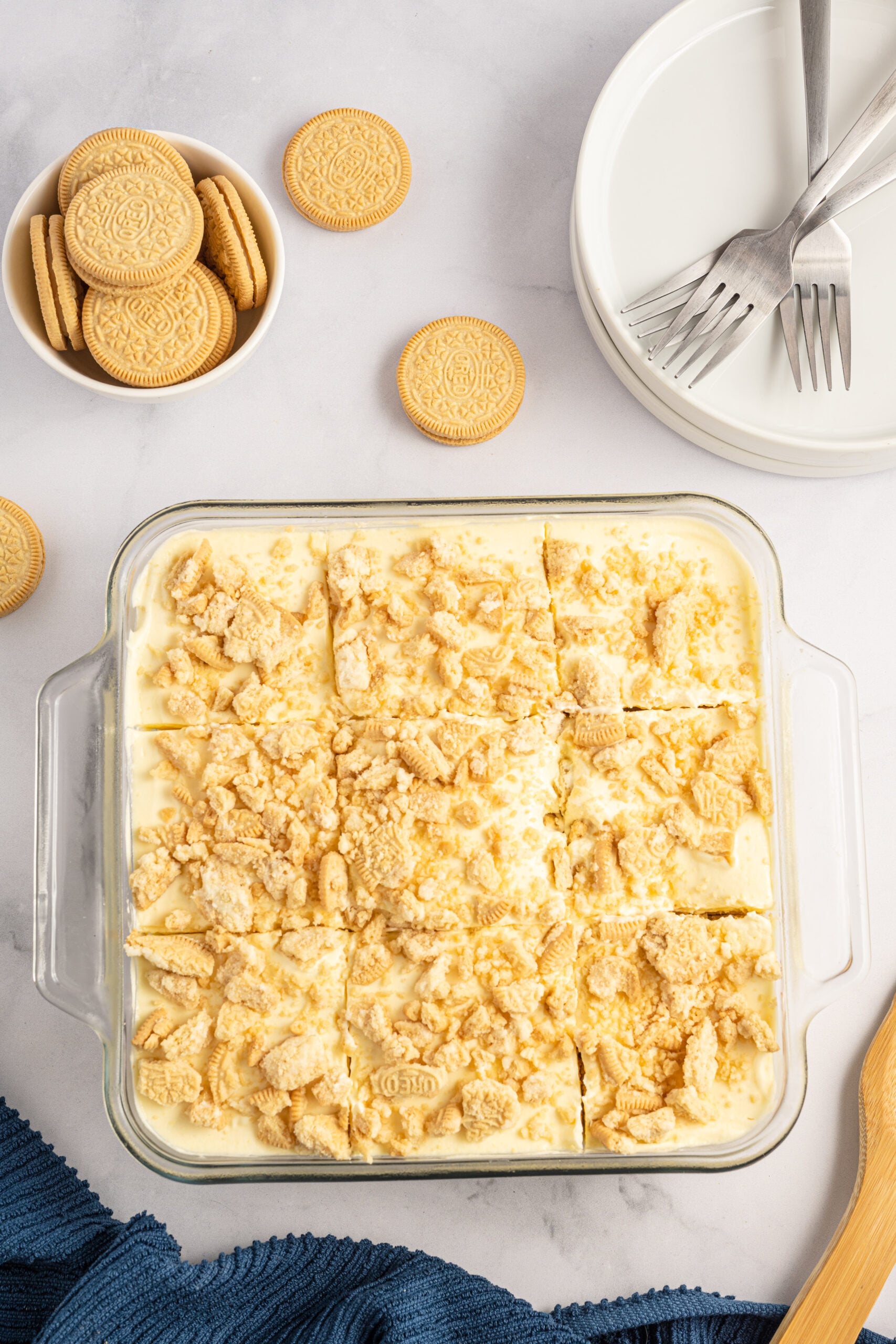 Overhead view of Golden Oreo Icebox Cake in a clear baking dish.