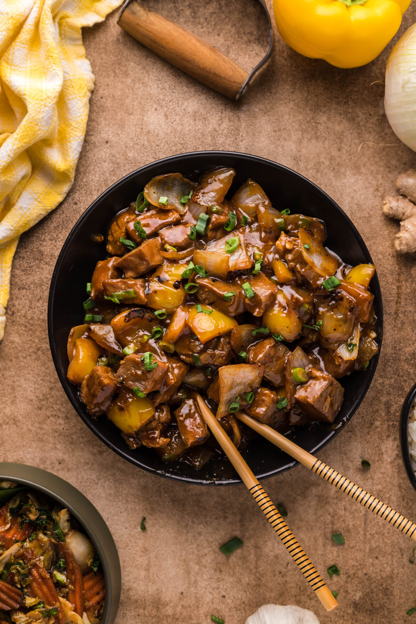 Overhead view of Teriyaki Steak Bites in a black dish.