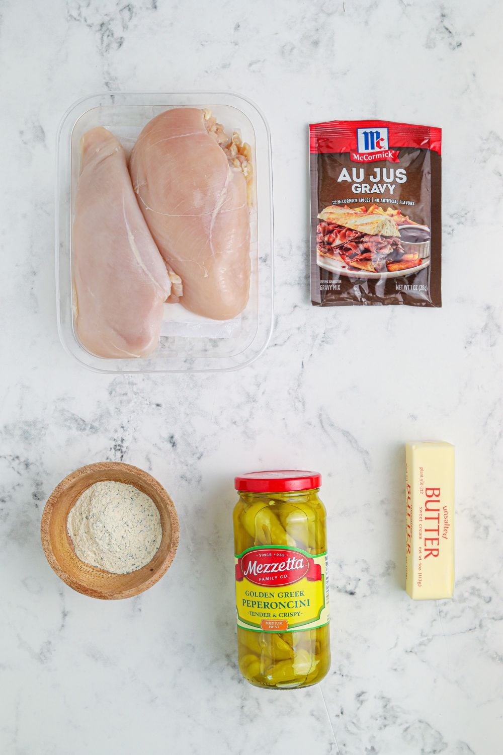 ingredients for mississippi chicken on marble counter