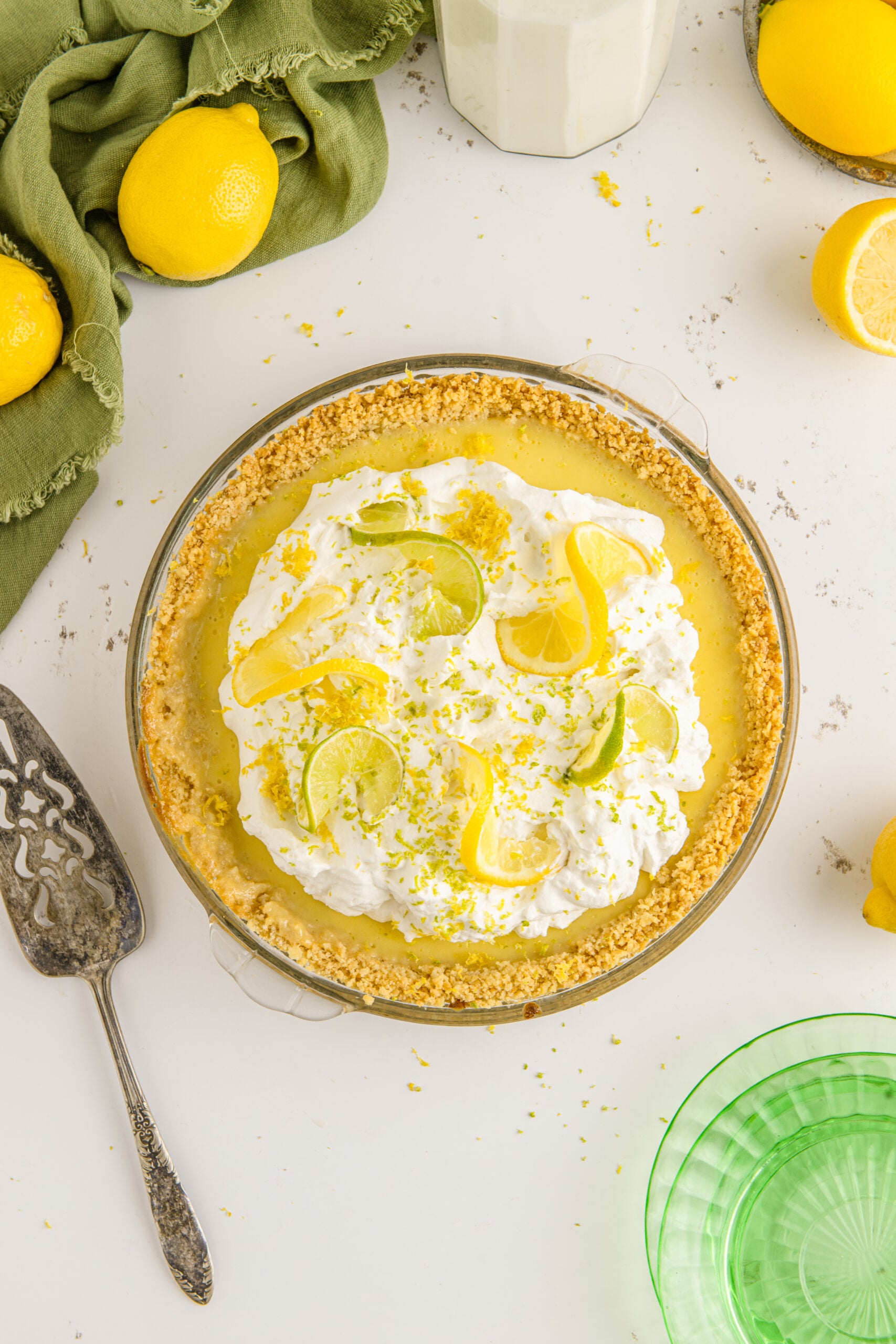 Overhead view of Atlantic Beach Pie topped with fresh lemons and limes.