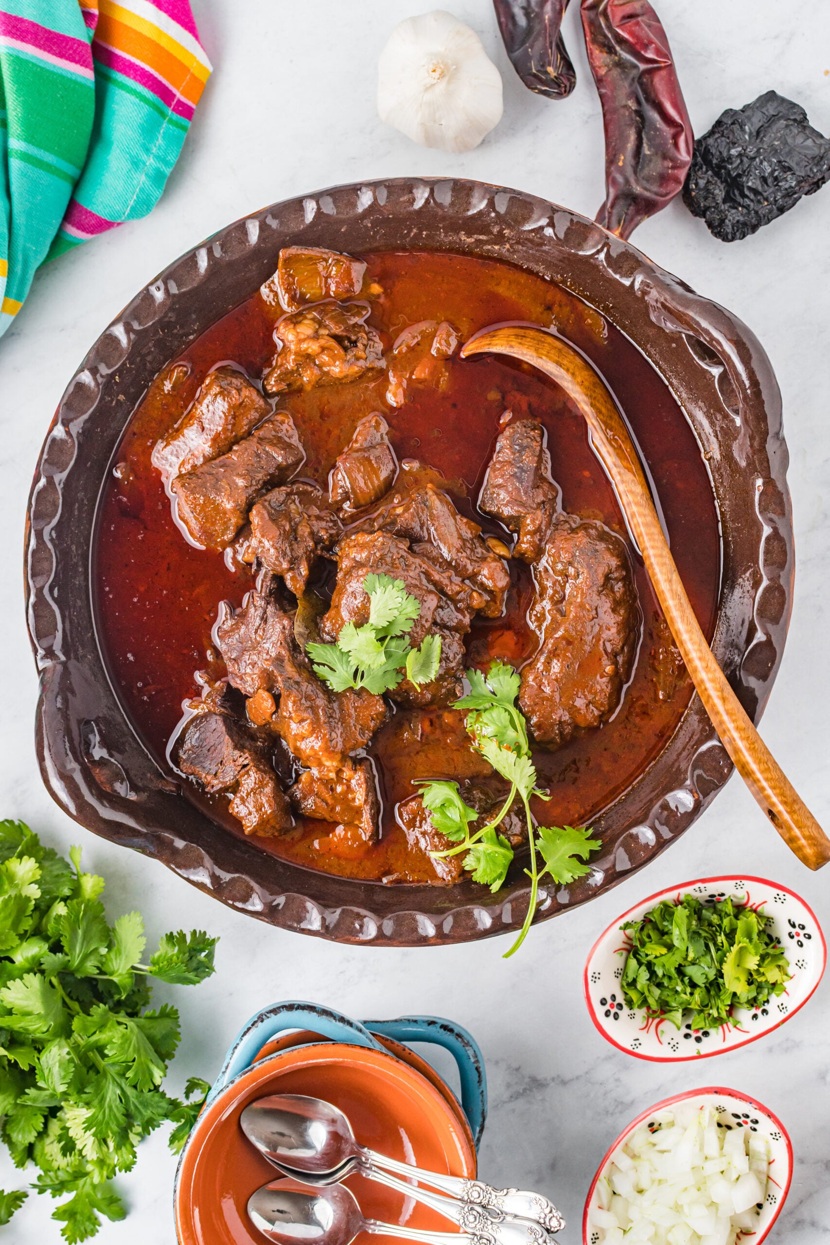 Overhead view of Beef Birria in a serving dish.