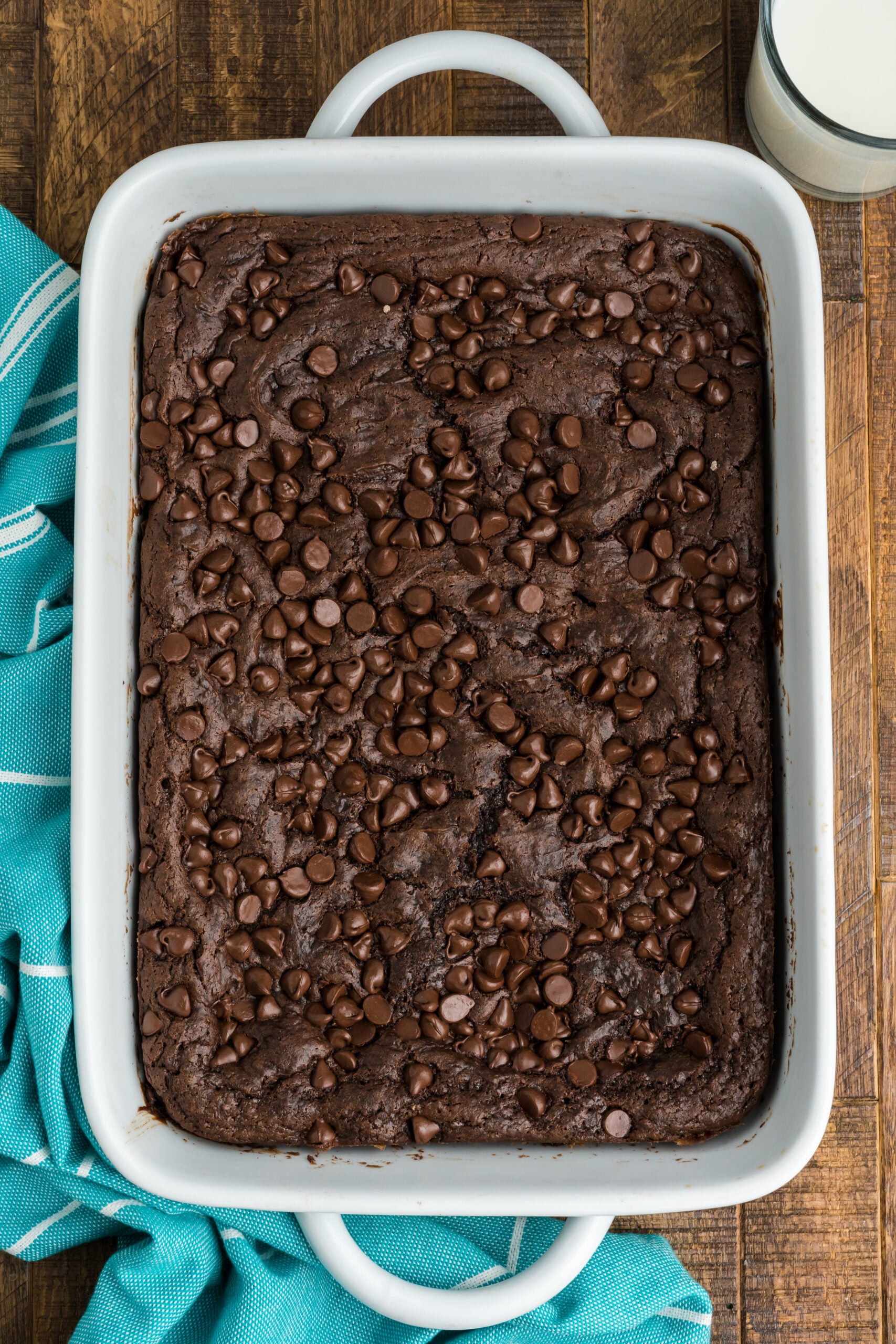 Overhead view of Chocolate Dump Cake in a white baking dish.